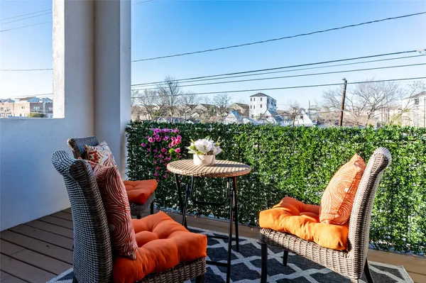 a outdoor dining space with furniture and outdoor view