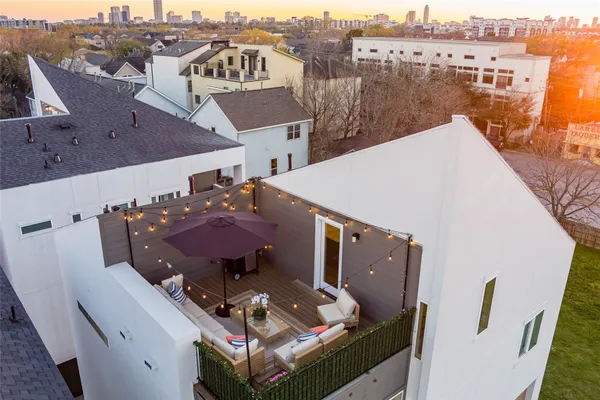 an aerial view of a house with a mountain view