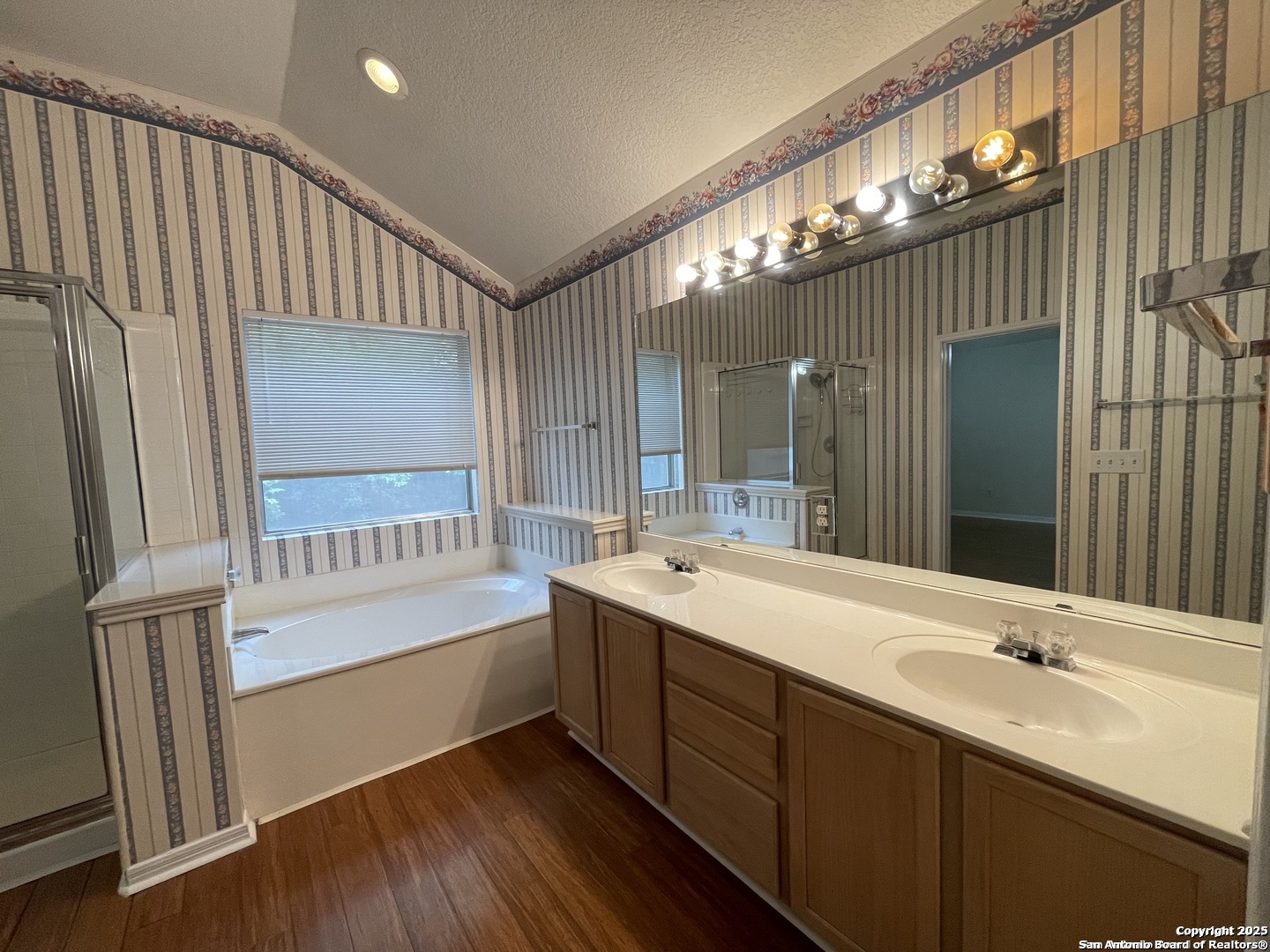 7522 Sutters Mine Converse, TX 78109 - Photo 17 of 18 a bathroom with a double vanity sink and a mirror
