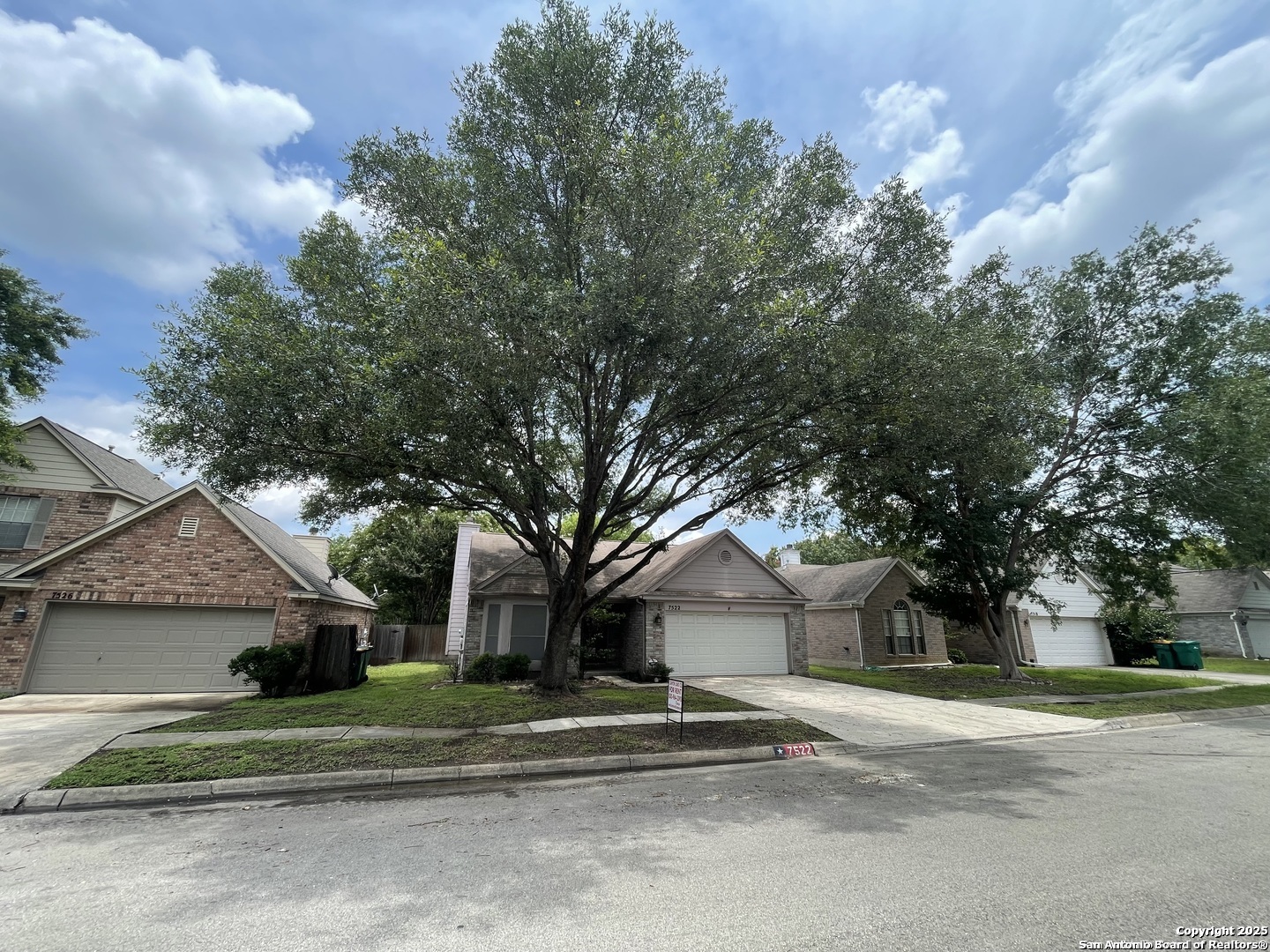 7522 Sutters Mine Converse, TX 78109 - Photo 2 of 18 front view of house with a trees
