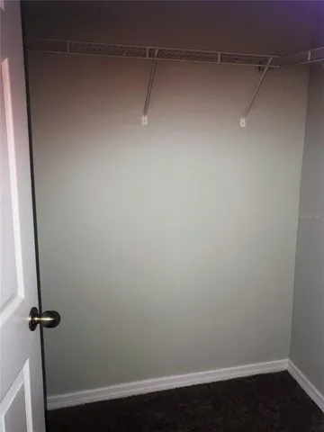 a view of a room with rack on the wall