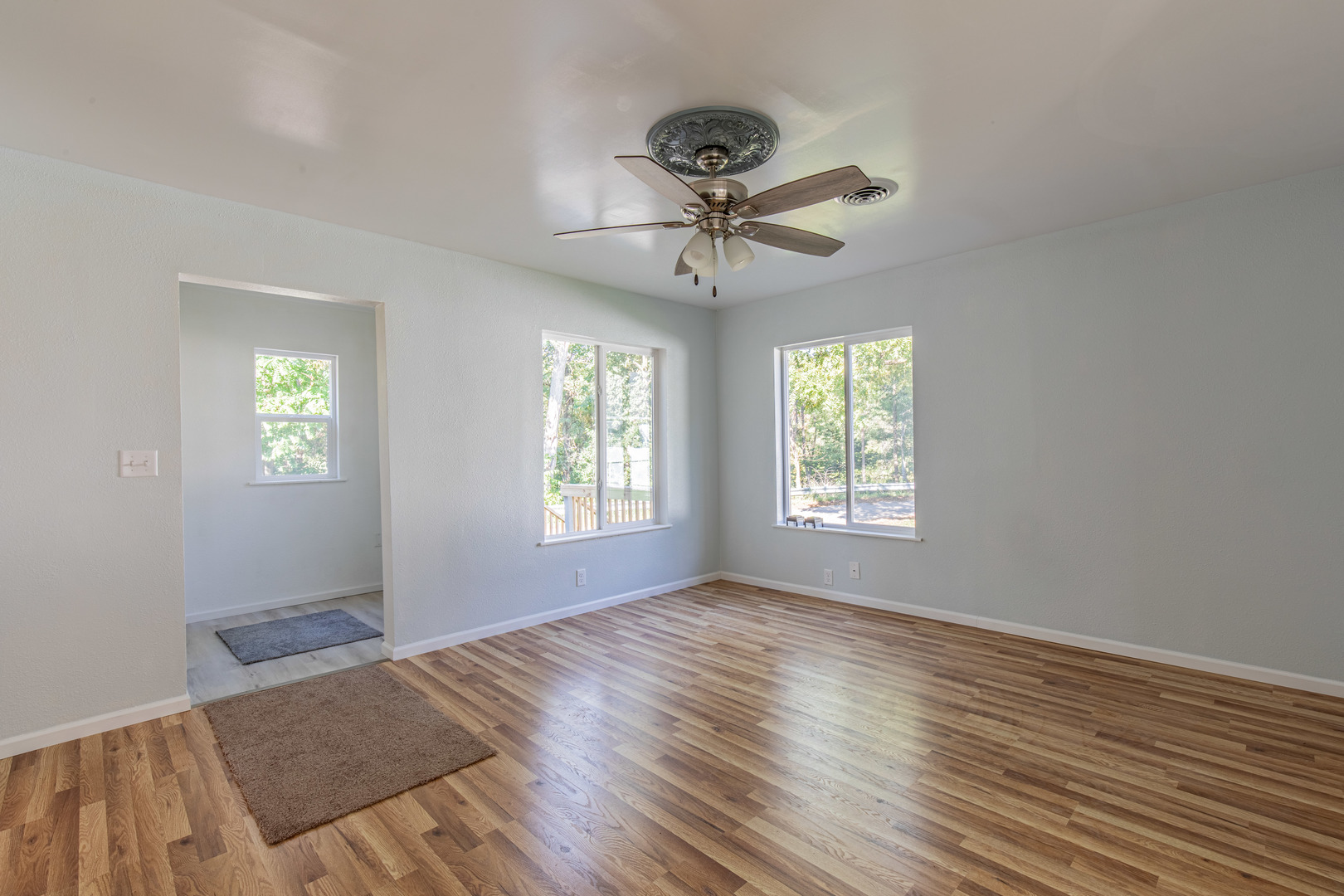 519 East Dakota Street Spring Valley, IL 61362 - Photo 11 of 23 a view of a room with wooden floor and windows