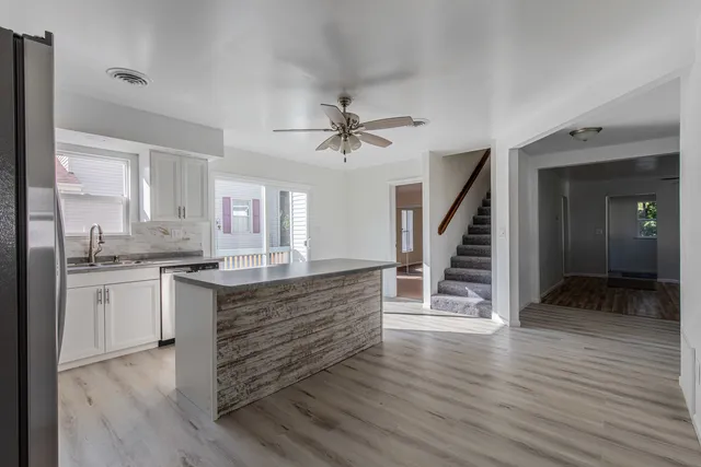 a view of cabinets and wooden floor