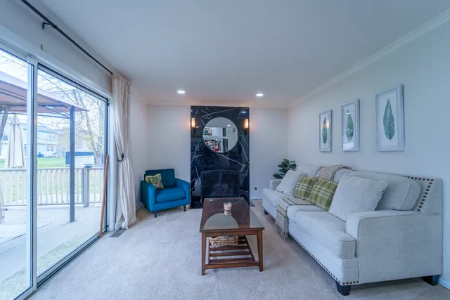 a living room with furniture and a couch