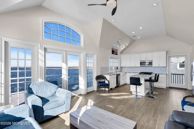 a living room with furniture and a table