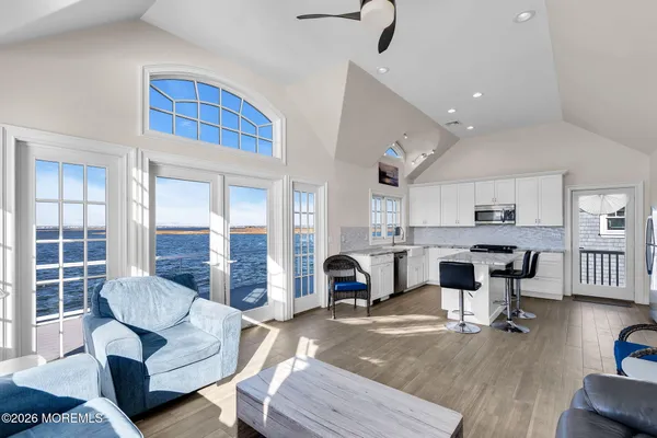 a living room with furniture and a table