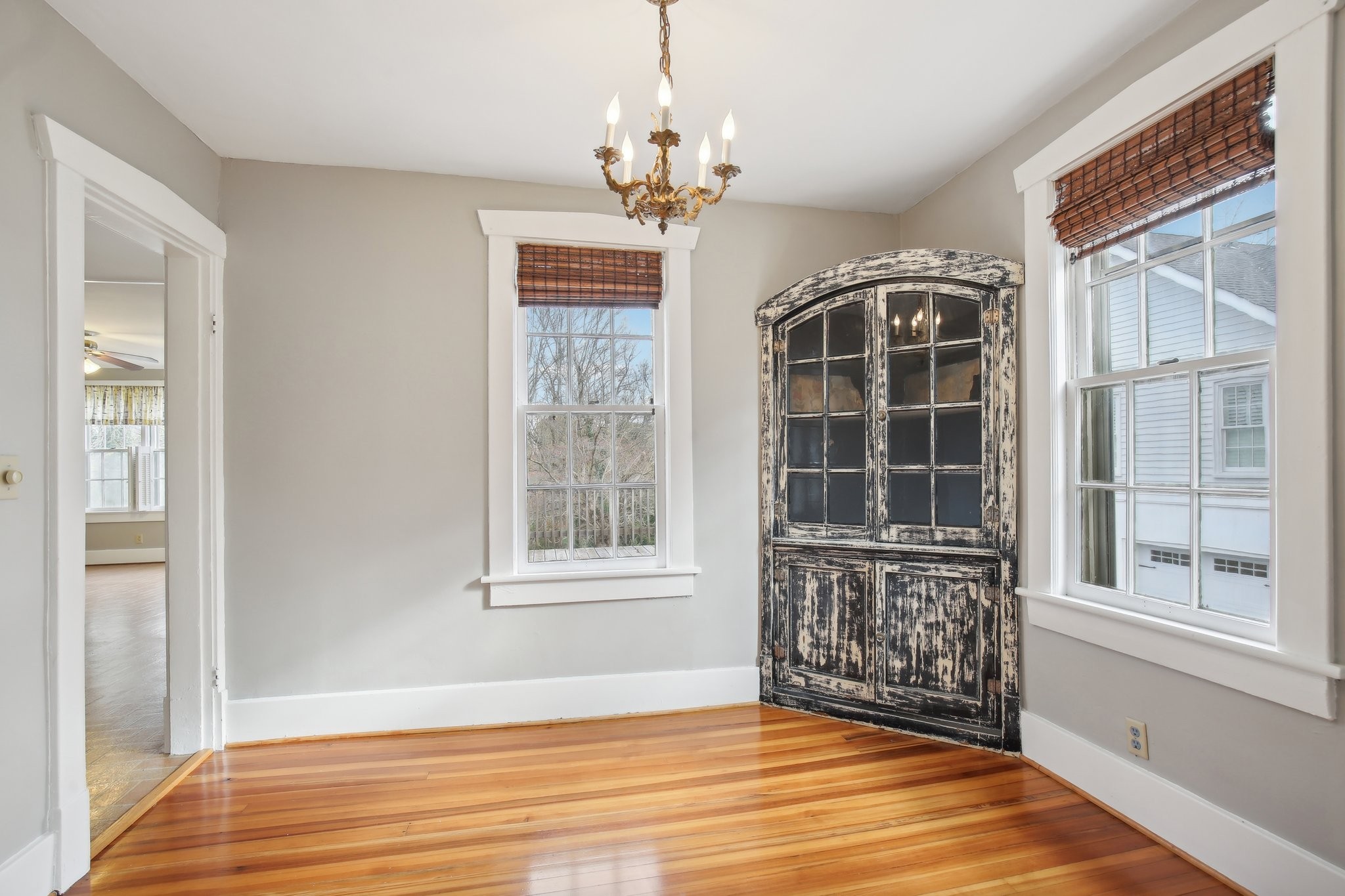 304 North Main Street Springfield, TN 37172 - Photo 12 of 60 a view of an empty room with wooden floor and a window