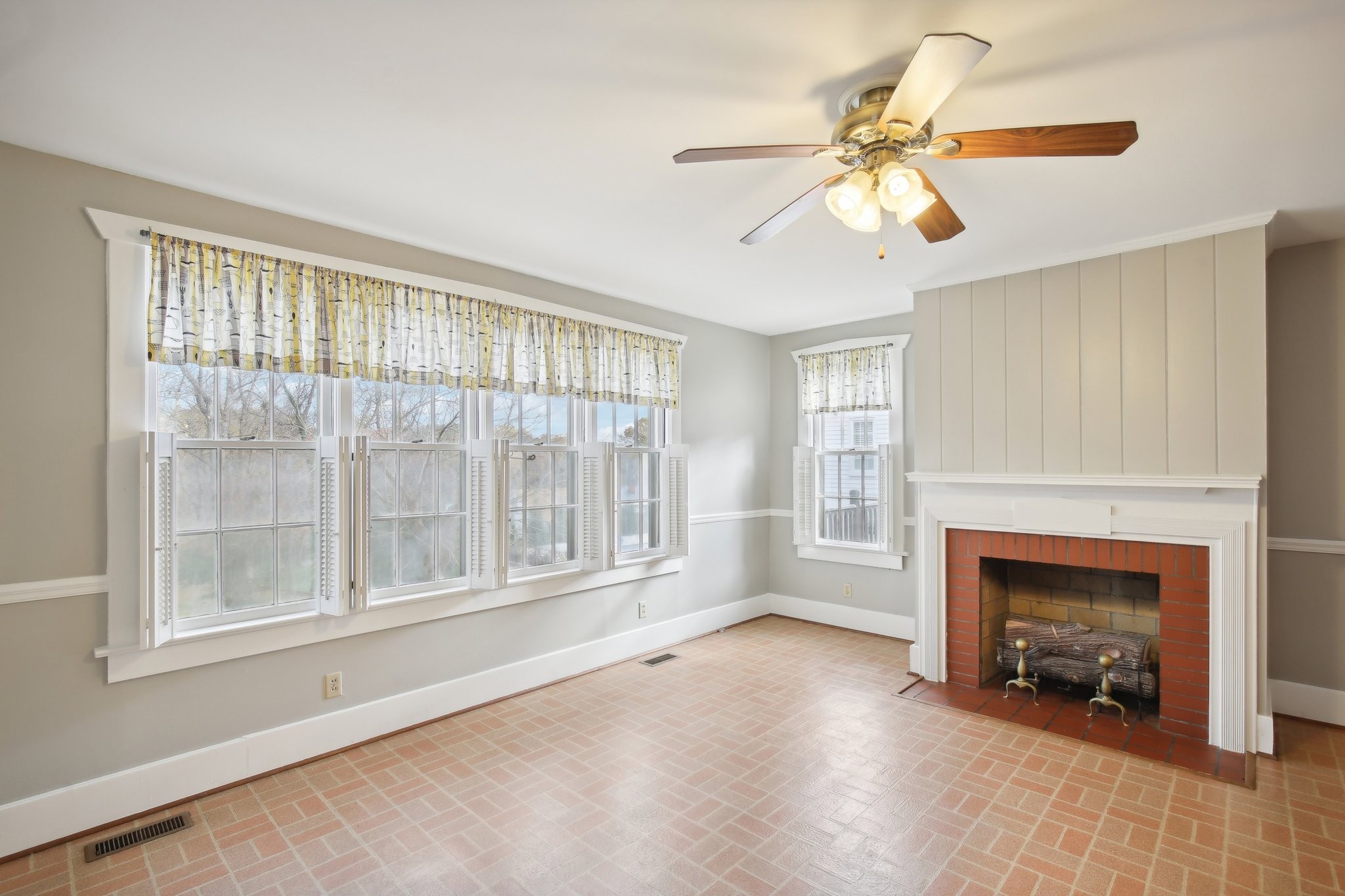 304 North Main Street Springfield, TN 37172 - Photo 16 of 60 a view of an empty room with a fireplace and a window