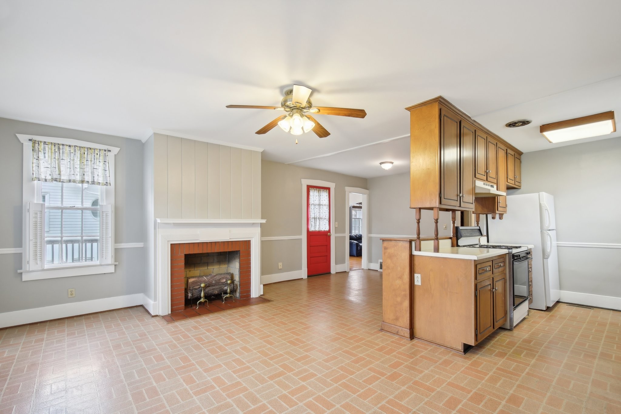 304 North Main Street Springfield, TN 37172 - Photo 17 of 60 a view of a kitchen with a stove cabinets and a fireplace