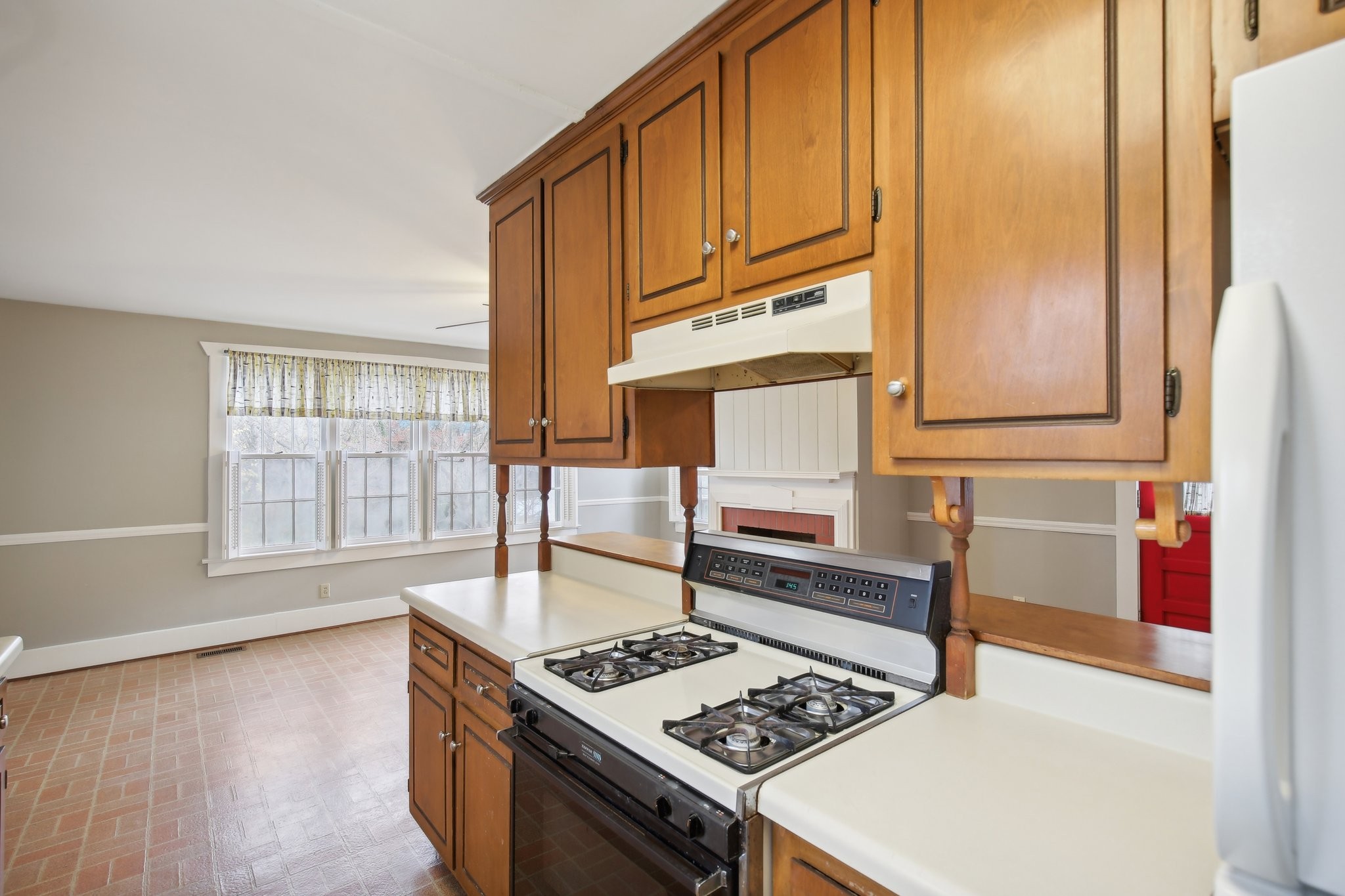 304 North Main Street Springfield, TN 37172 - Photo 22 of 60 a kitchen with stainless steel appliances granite countertop a stove a sink and a microwave