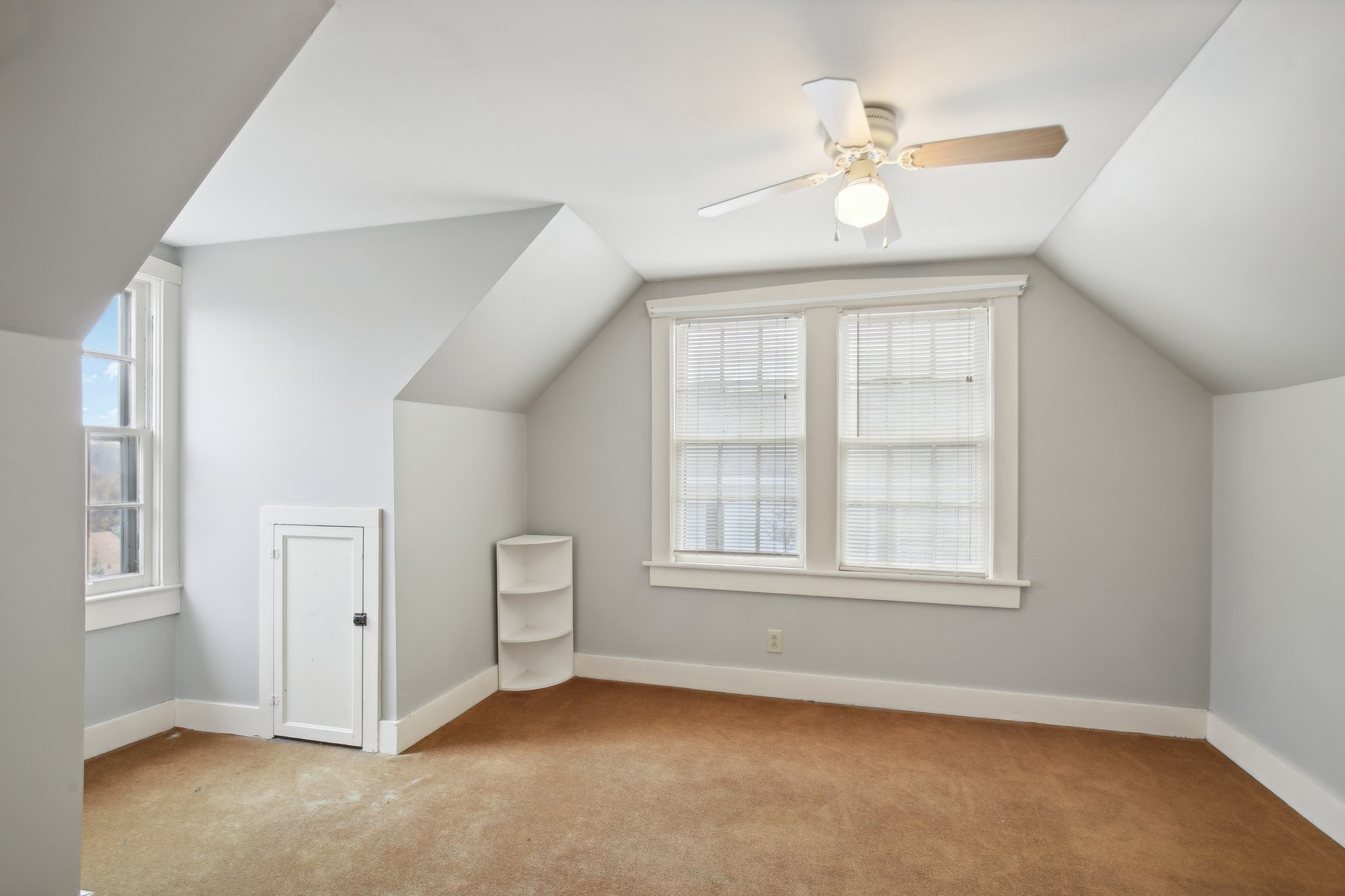 304 North Main Street Springfield, TN 37172 - Photo 30 of 60 an empty room with chandelier fan and windows