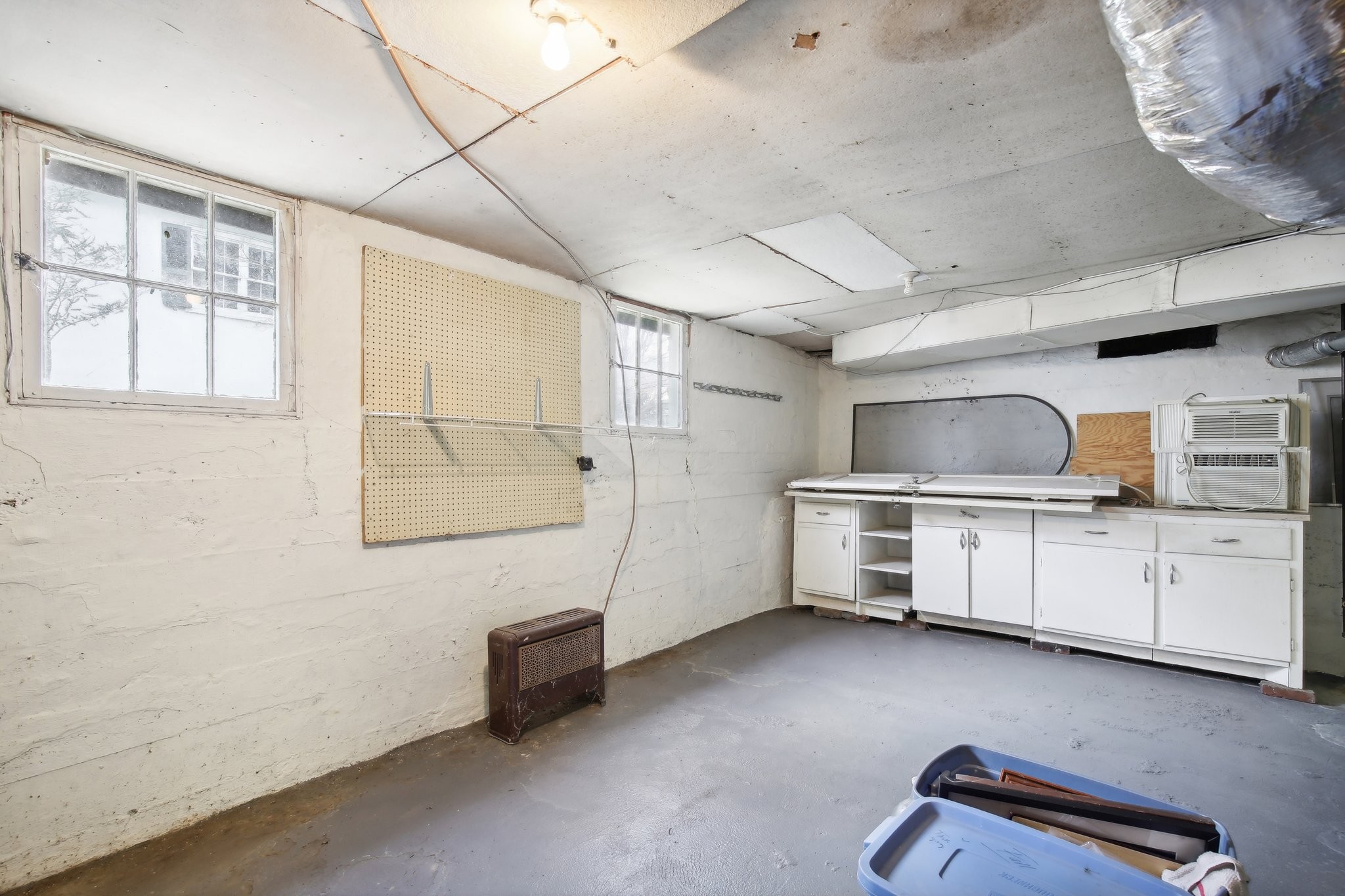 304 North Main Street Springfield, TN 37172 - Photo 38 of 60 a kitchen with white cabinets and white appliances