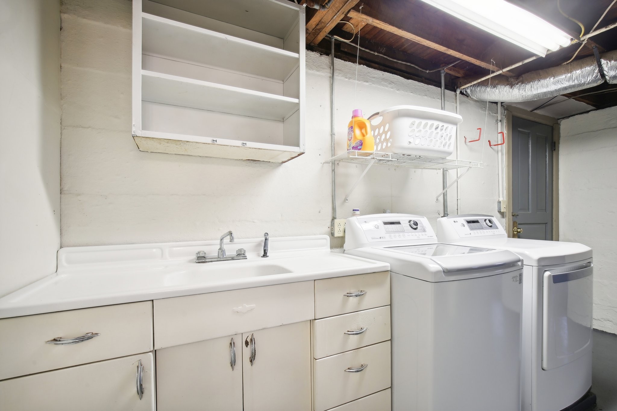 304 North Main Street Springfield, TN 37172 - Photo 40 of 60 a utility room with cabinets washer and dryer
