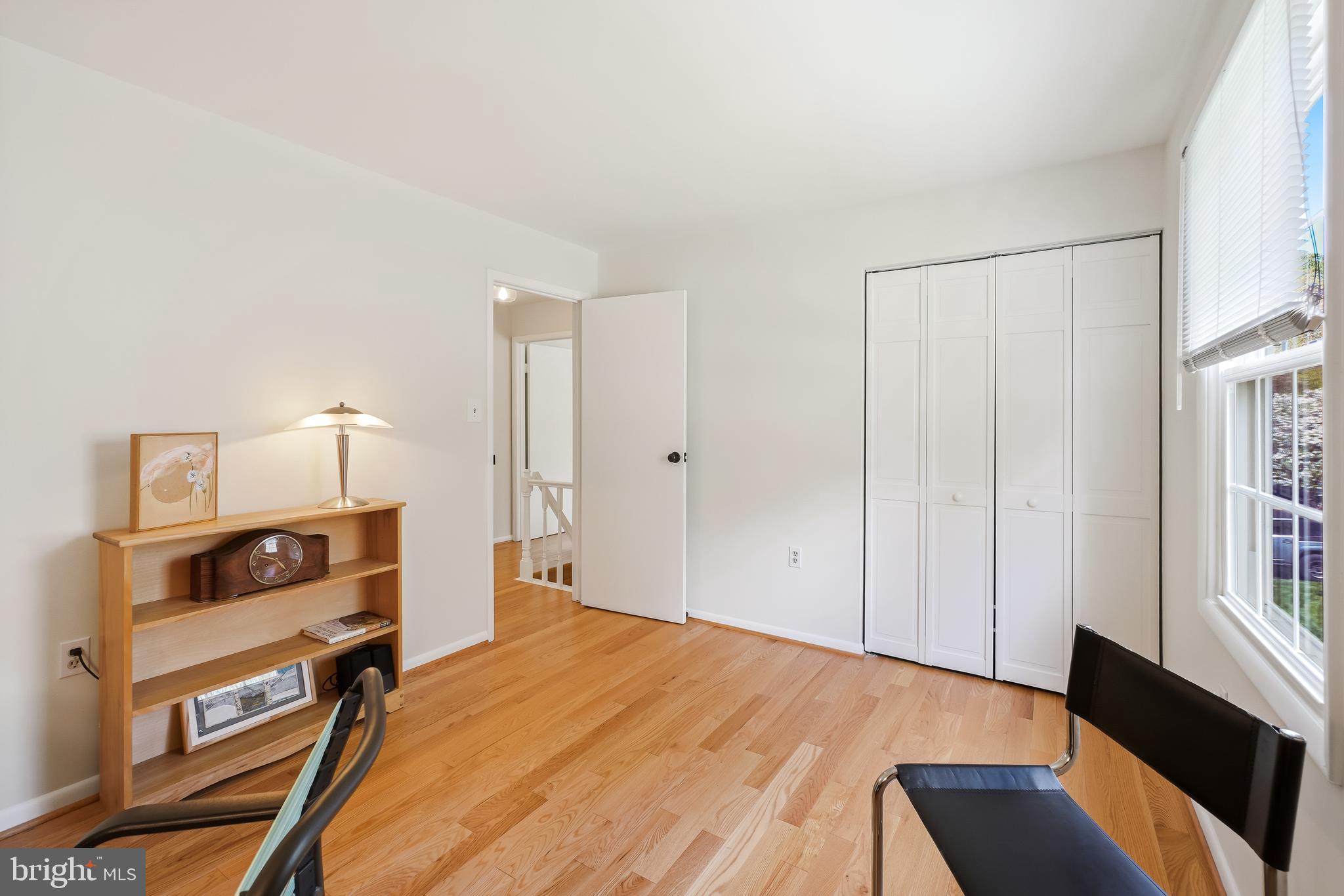 10908 Howland Drive Reston, VA 20191 - Photo 30 of 46 a view of a bedroom with furniture and window