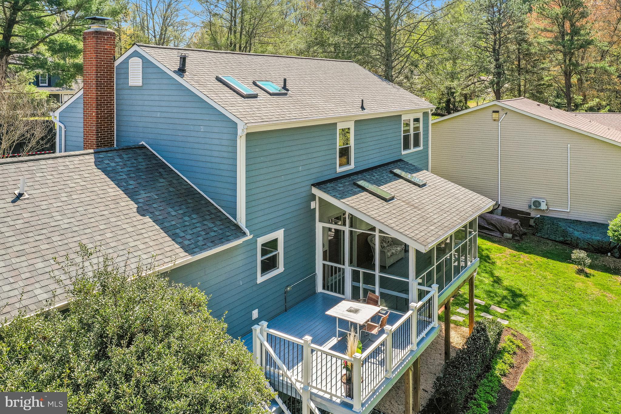 10908 Howland Drive Reston, VA 20191 - Photo 36 of 46 a aerial view of a house with a yard and balcony