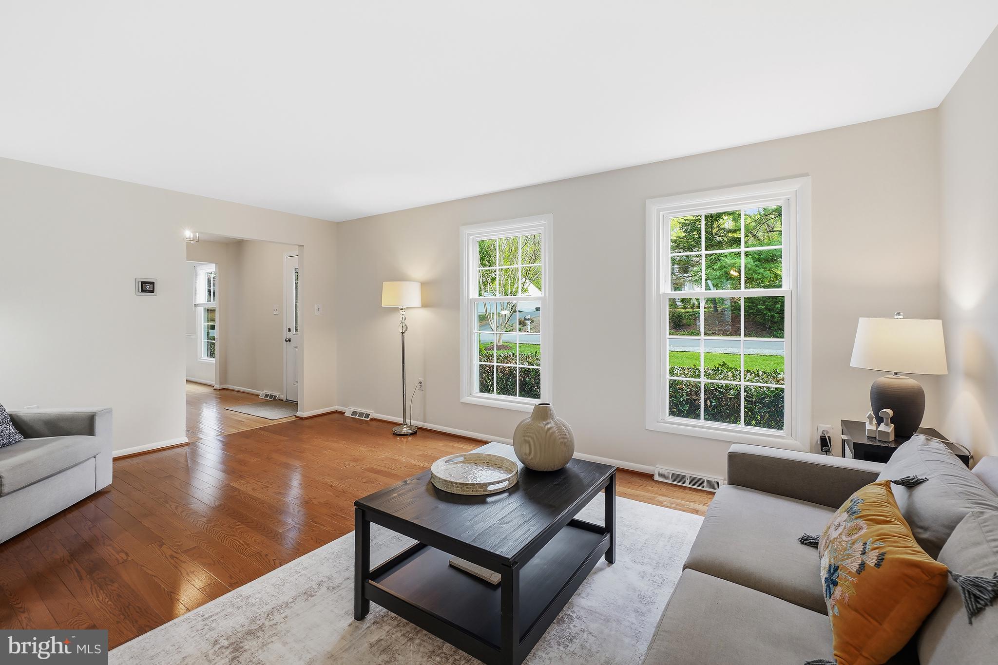 10908 Howland Drive Reston, VA 20191 - Photo 7 of 46 a living room with furniture and a large window