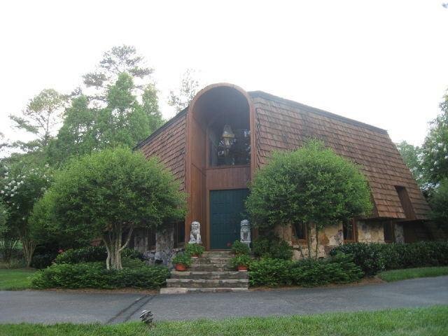 1 Quail Hollow Rome, GA 30161 - Photo 1 of 1 a front view of a house with a yard and plants