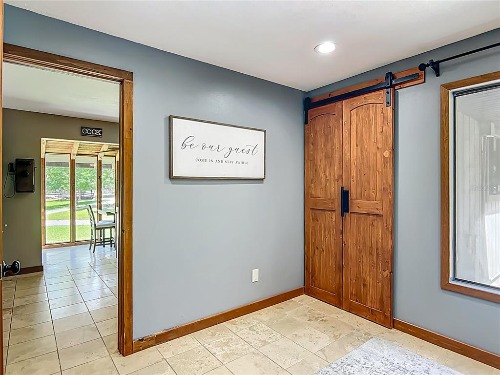 4661 Southwest 7th Avenue Road Ocala, FL 34471 - Photo 17 of 94 a view of an empty room with a window