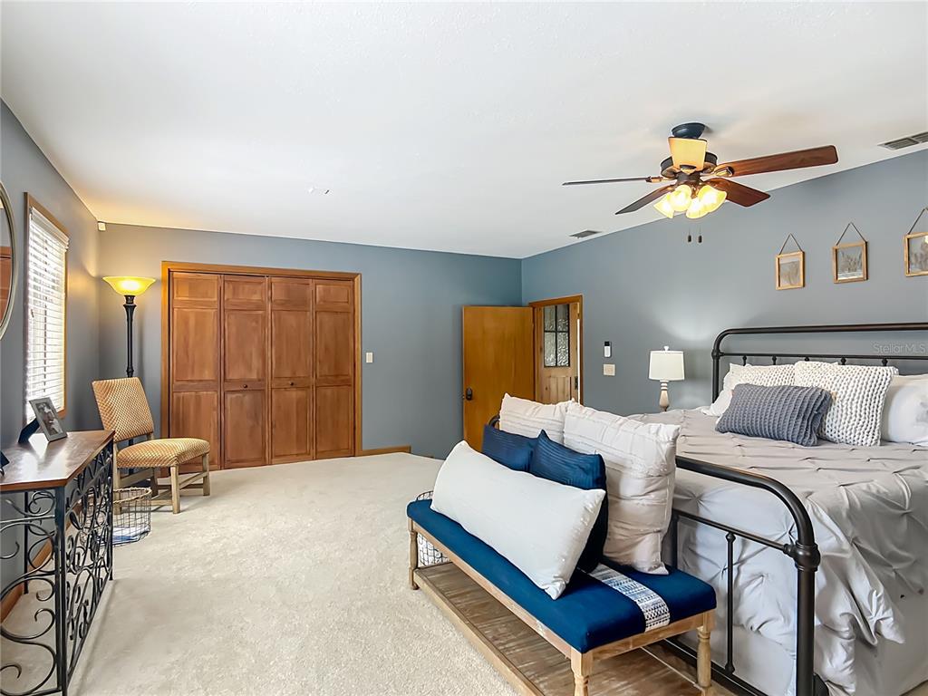 4661 Southwest 7th Avenue Road Ocala, FL 34471 - Photo 35 of 94 a bedroom with a bed and window