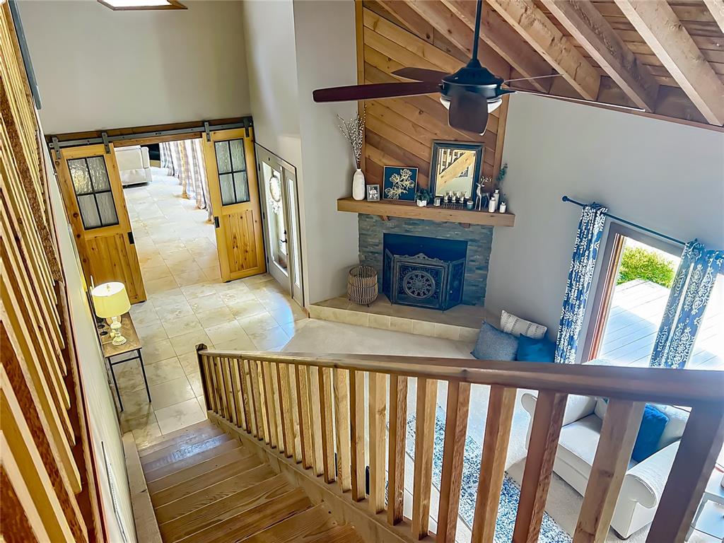 4661 Southwest 7th Avenue Road Ocala, FL 34471 - Photo 42 of 94 a view of a porch with wooden floor and furniture