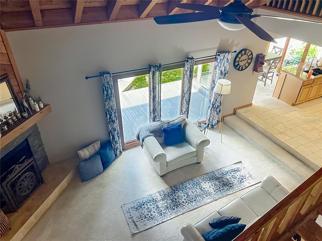 4661 Southwest 7th Avenue Road Ocala, FL 34471 - Photo 43 of 94 a living room with furniture and a rug