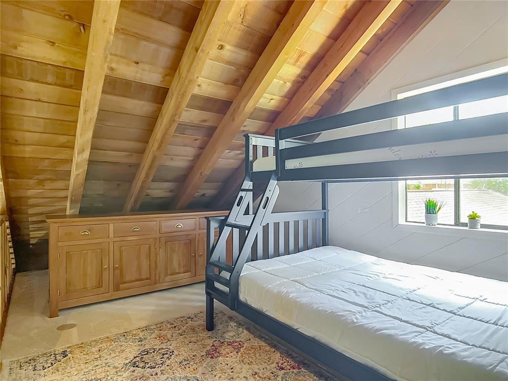 4661 Southwest 7th Avenue Road Ocala, FL 34471 - Photo 46 of 94 a bedroom with a bed and wooden floor