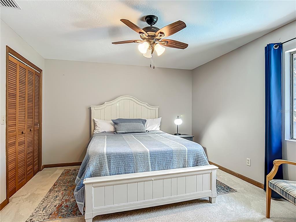 4661 Southwest 7th Avenue Road Ocala, FL 34471 - Photo 48 of 94 a bedroom with a bed and window