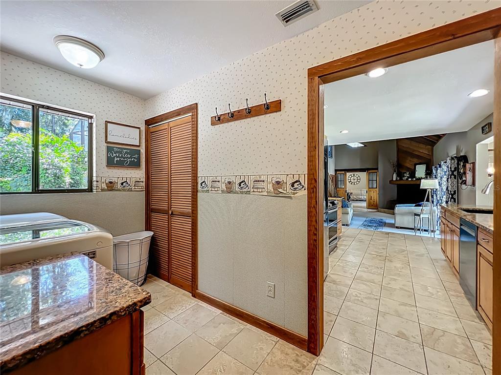 4661 Southwest 7th Avenue Road Ocala, FL 34471 - Photo 60 of 94 a view of a kitchen with furniture and a window