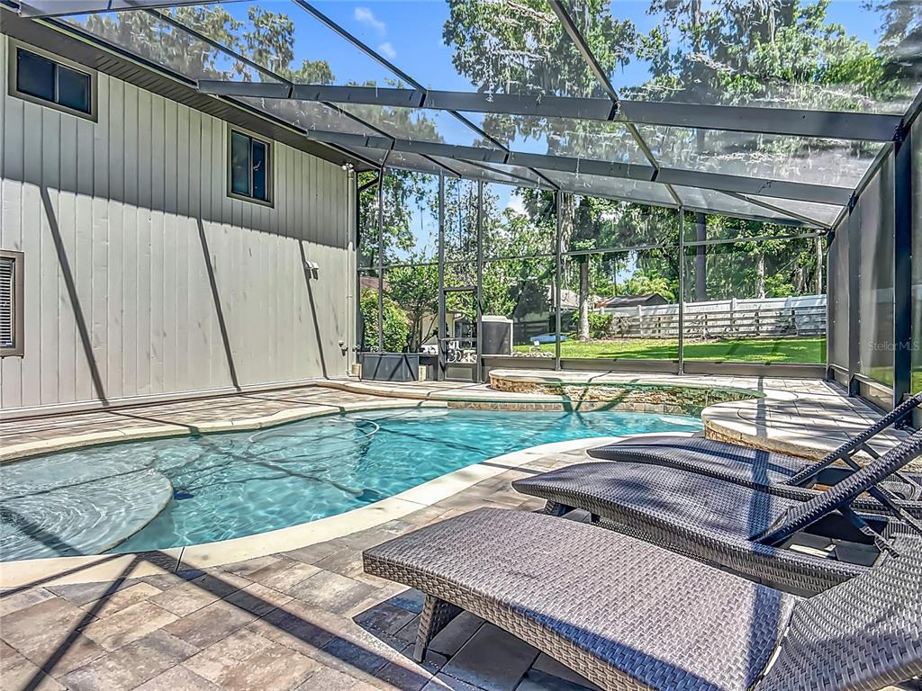 4661 Southwest 7th Avenue Road Ocala, FL 34471 - Photo 70 of 94 a view of a backyard with sitting area