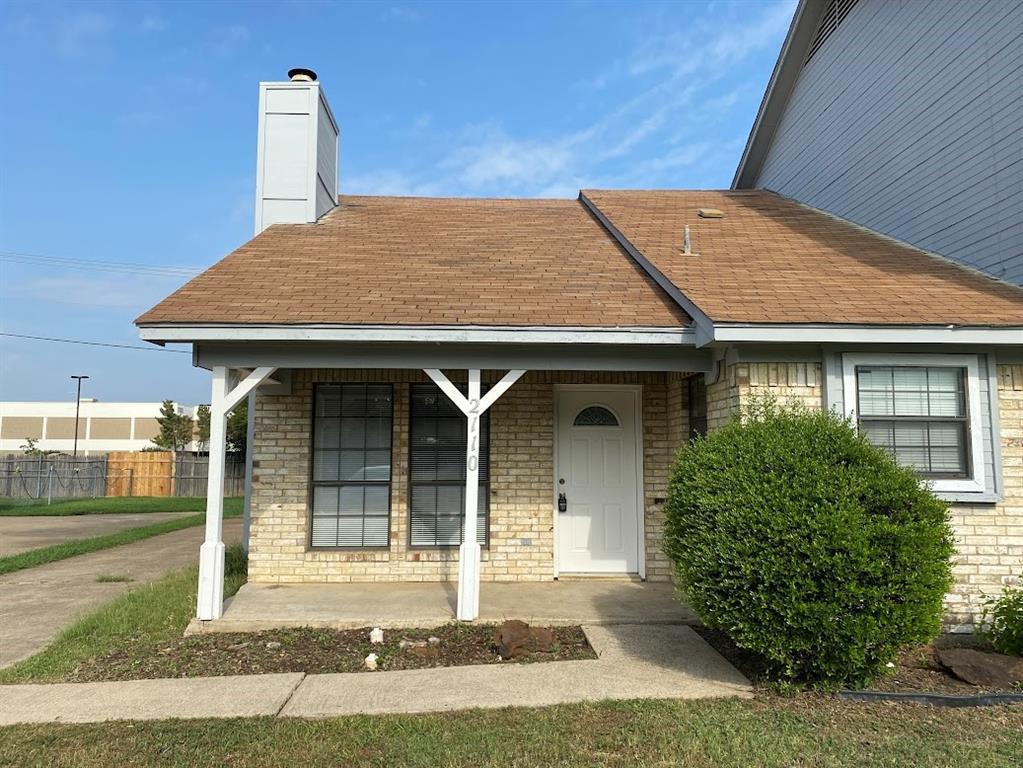 2110 Stone Moss Lane Grapevine, TX 76051 - Photo 1 of 14 a front view of a house with garden