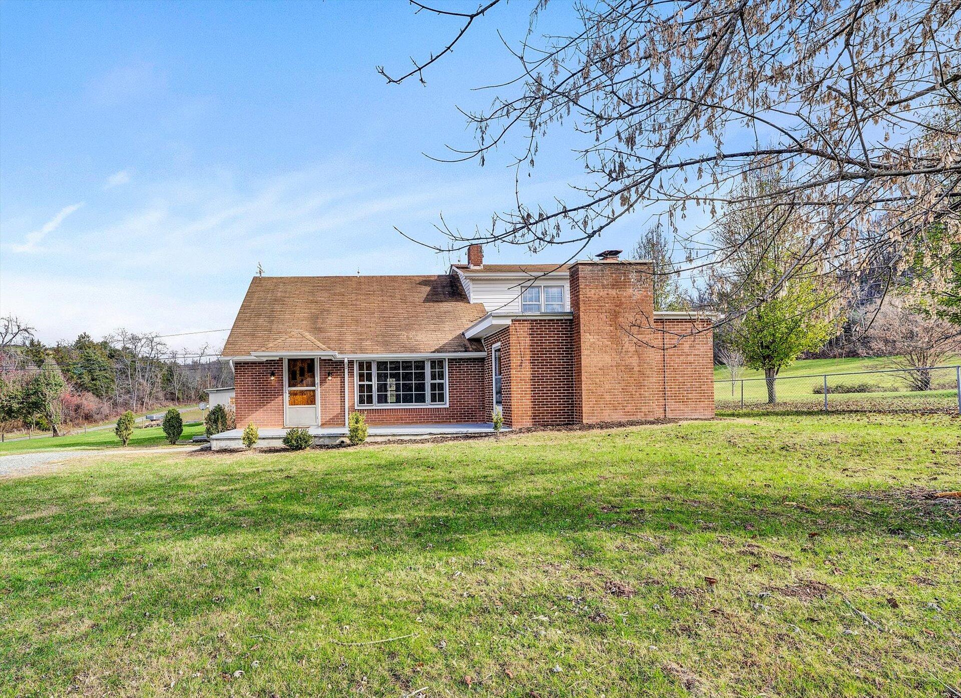 5206 Riner Road Riner, VA 24149 - Photo 31 of 31 front view of a house with a yard