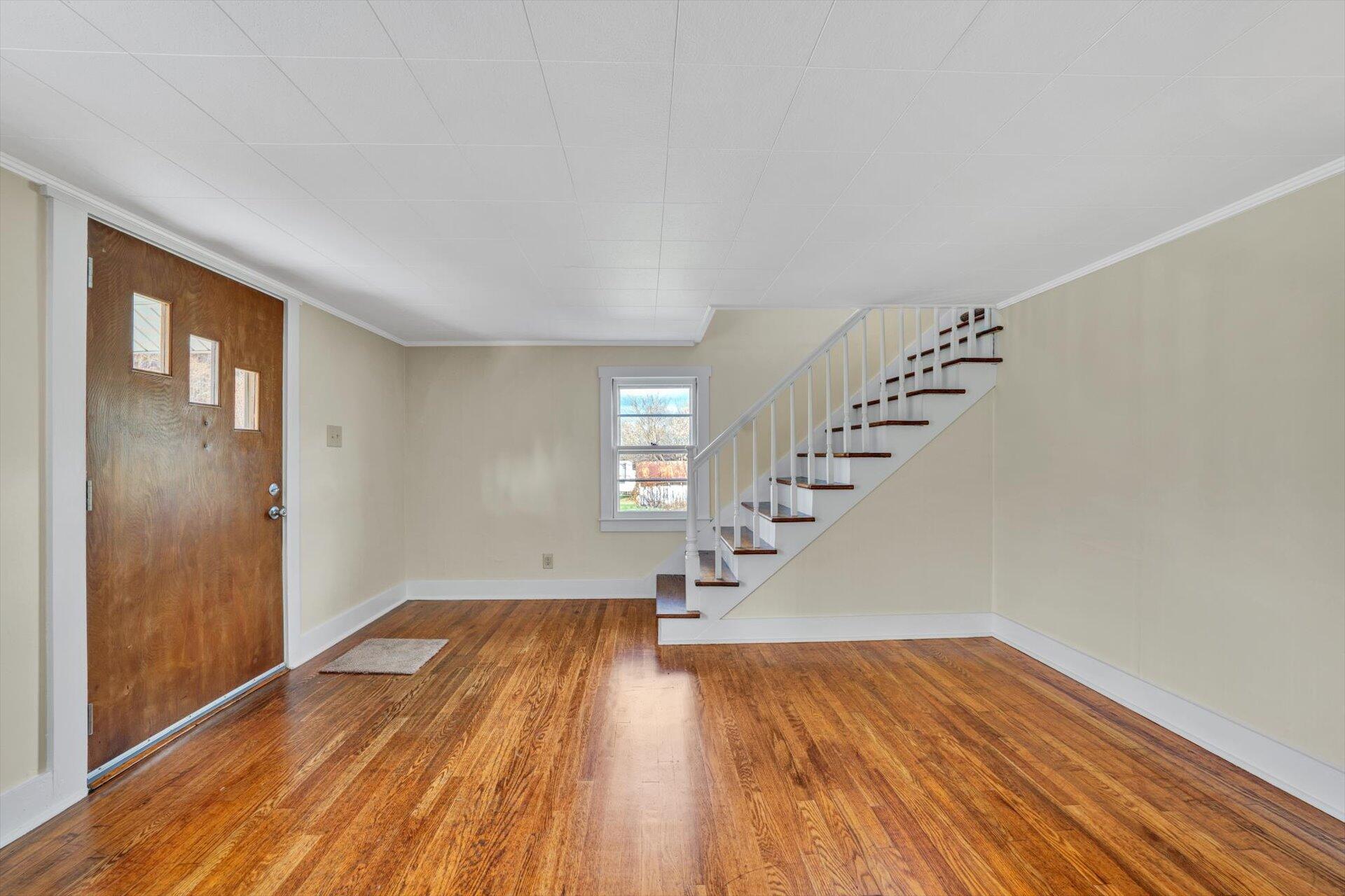 5206 Riner Road Riner, VA 24149 - Photo 4 of 31 a view of entryway with wooden floor