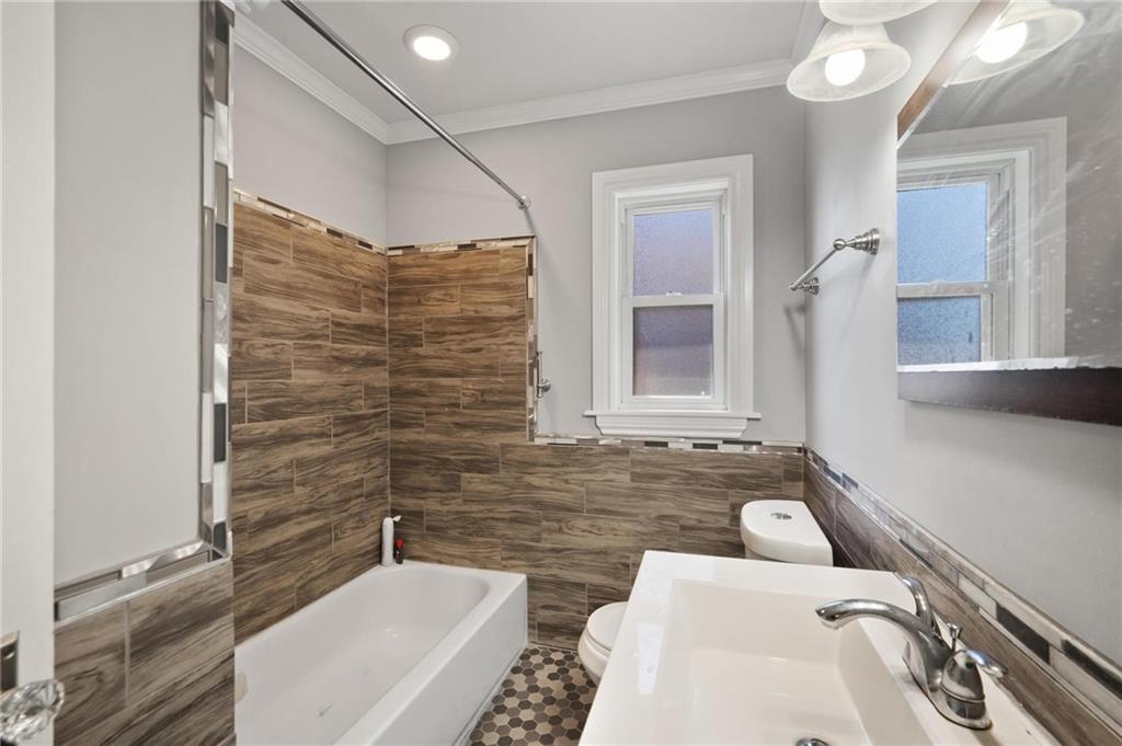 2630 Mt Royal Road Pittsburgh, PA 15217 - Photo 17 of 21 a bathroom with a sink and a mirror