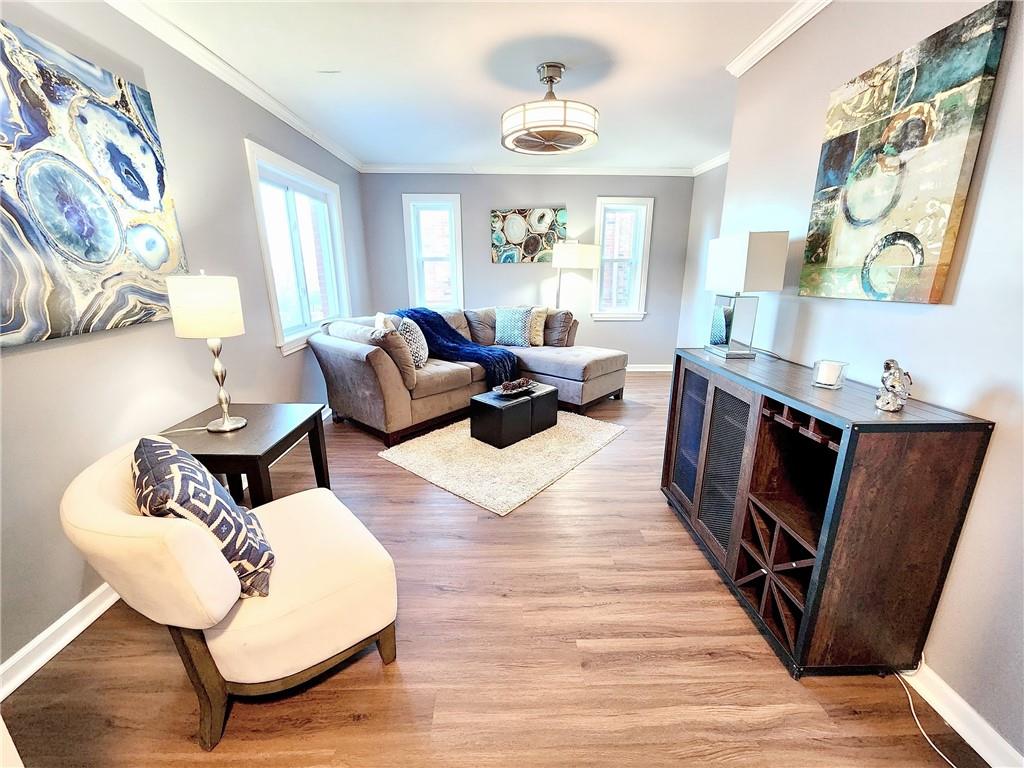 2630 Mt Royal Road Pittsburgh, PA 15217 - Photo 4 of 21 a living room with furniture and a window