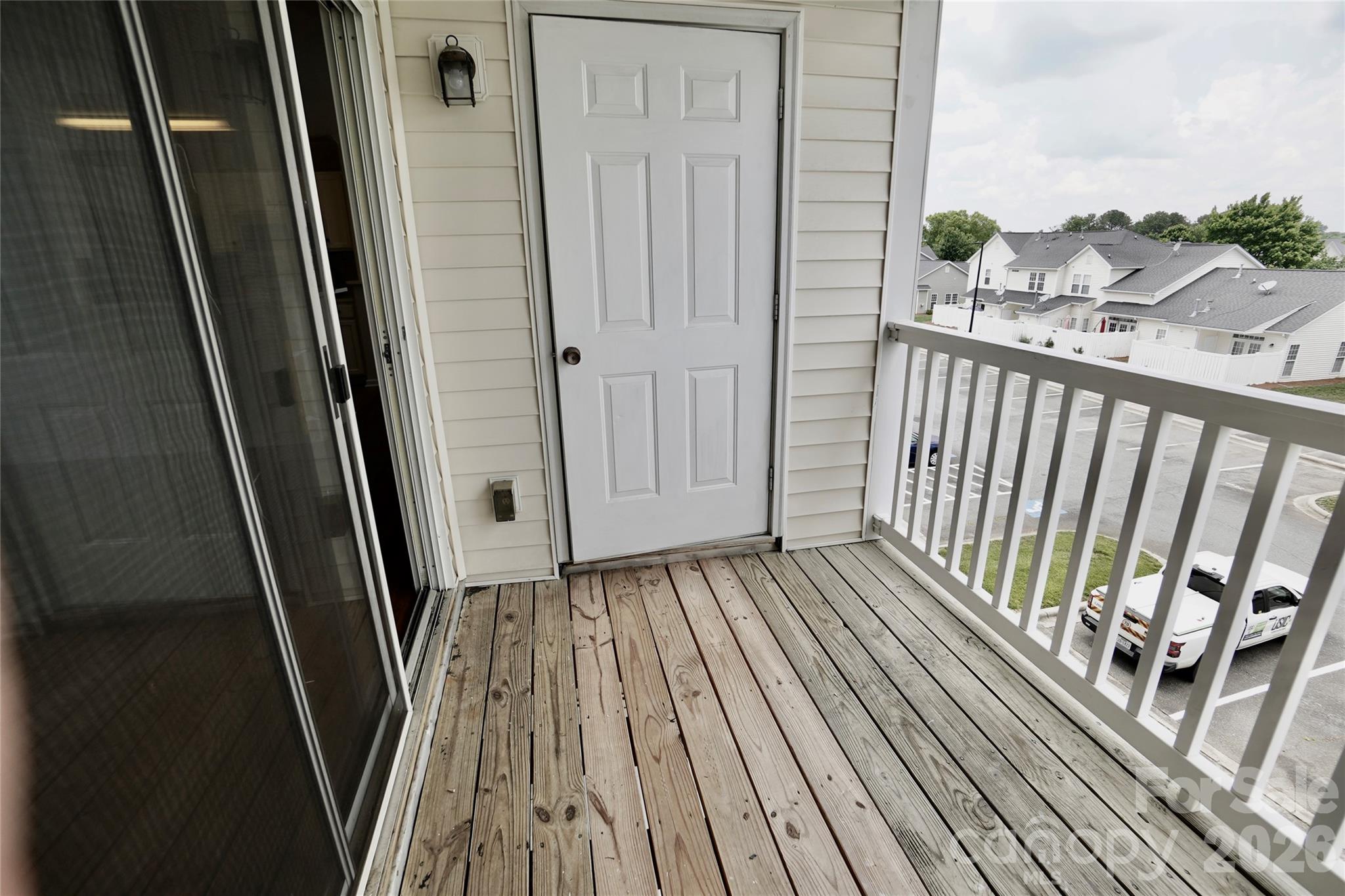 4010 Town Center Road Harrisburg, NC 28075 - Photo 13 of 17 a view of a house with wooden floor