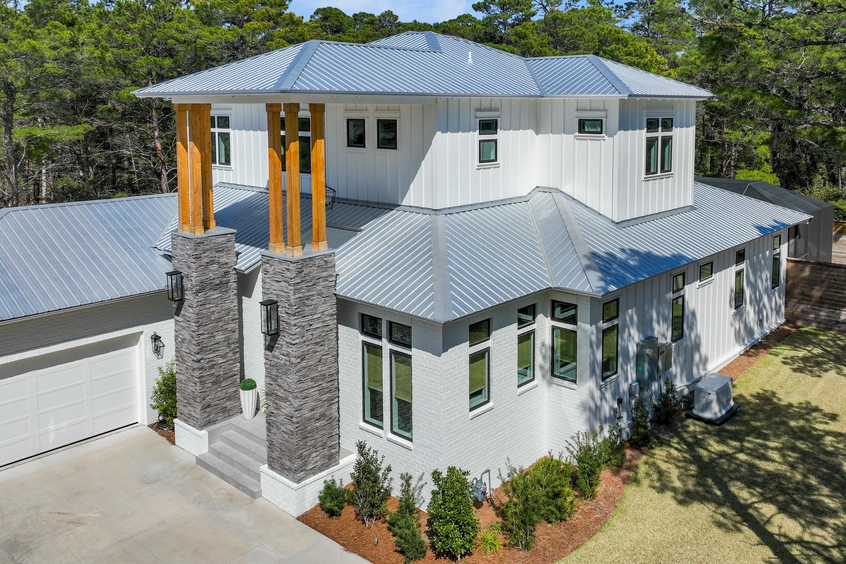 88 Beth Lane Santa Rosa Beach, FL 32459 - Photo 11 of 79 a aerial view of a house with a yard and balcony