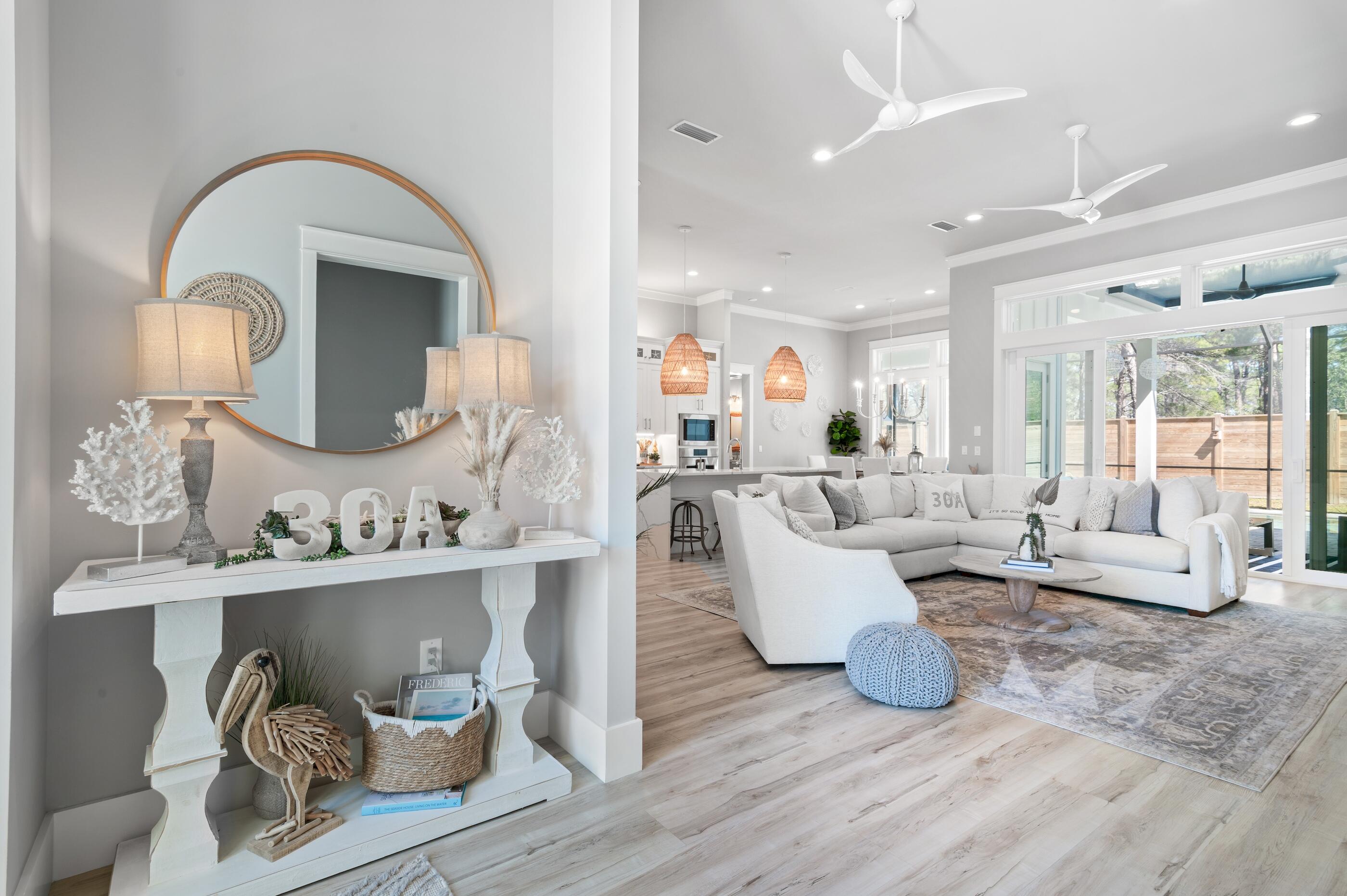 88 Beth Lane Santa Rosa Beach, FL 32459 - Photo 17 of 79 a living room with furniture and a wooden floor