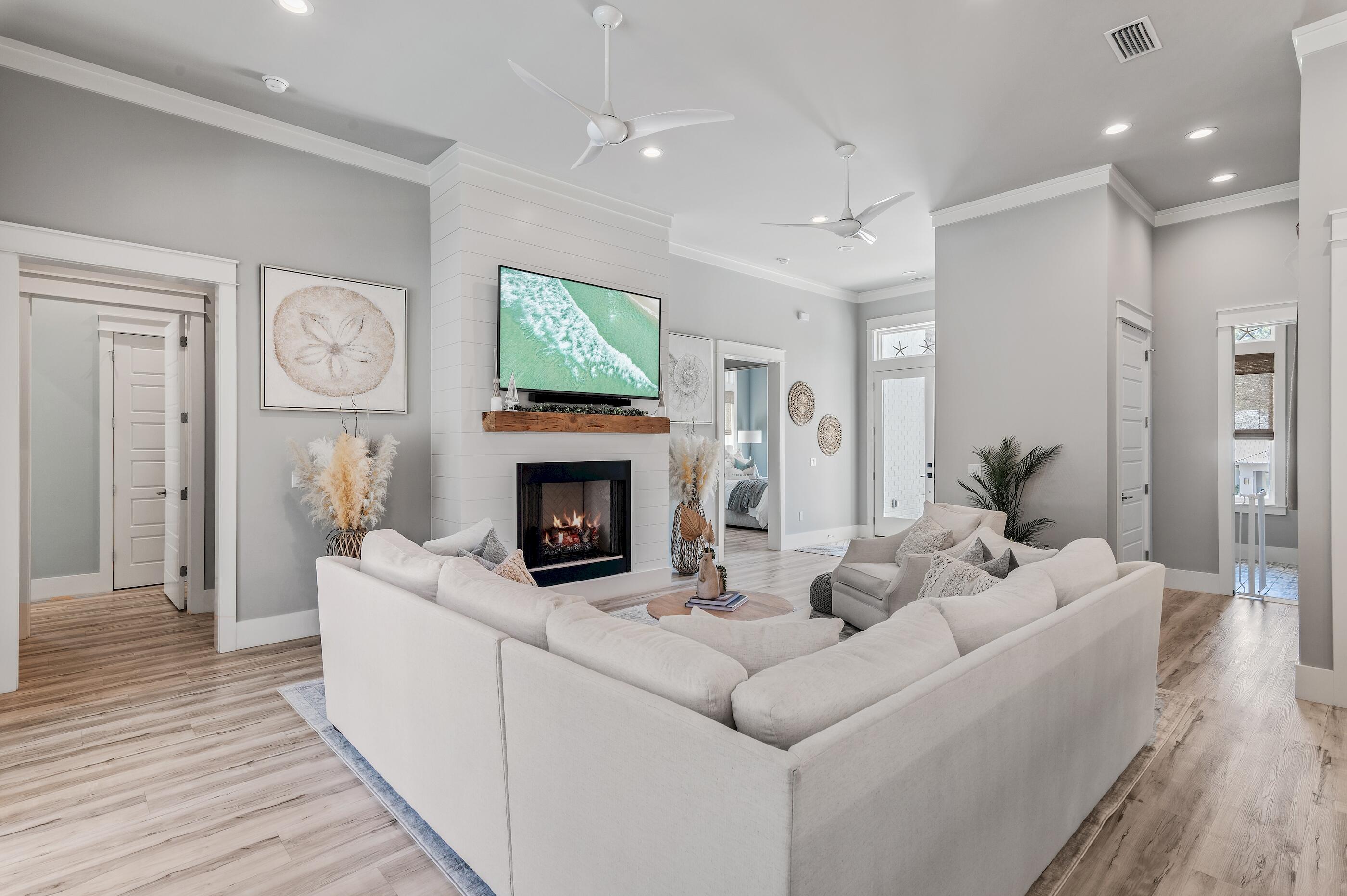 88 Beth Lane Santa Rosa Beach, FL 32459 - Photo 20 of 79 a living room with furniture and a fireplace