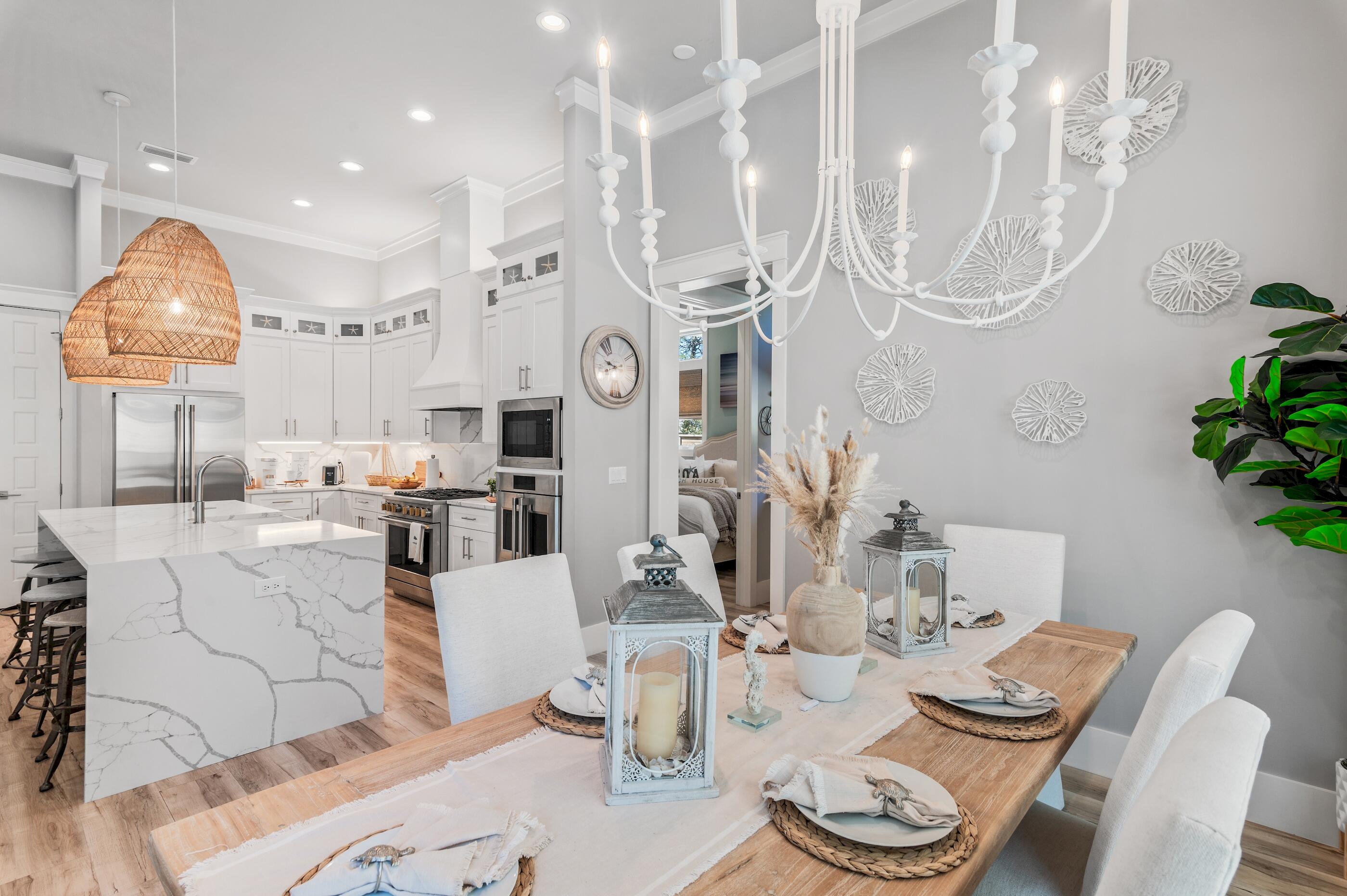 88 Beth Lane Santa Rosa Beach, FL 32459 - Photo 27 of 79 a living room with lots of furniture and a chandelier