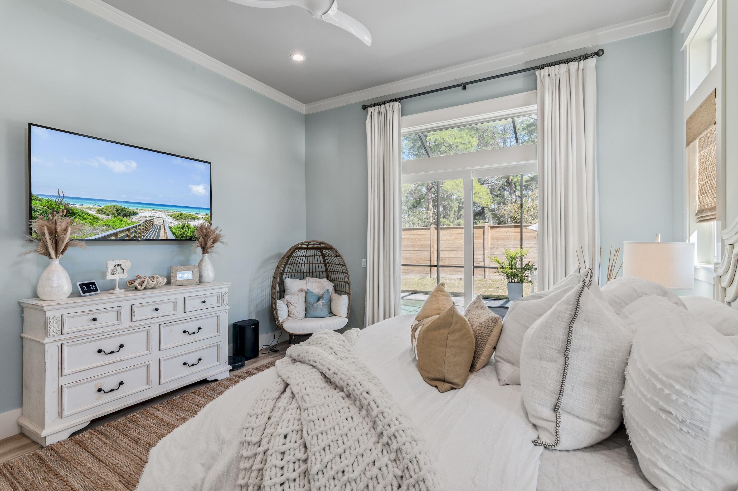 88 Beth Lane Santa Rosa Beach, FL 32459 - Photo 30 of 79 a bedroom with a bed and a dresser