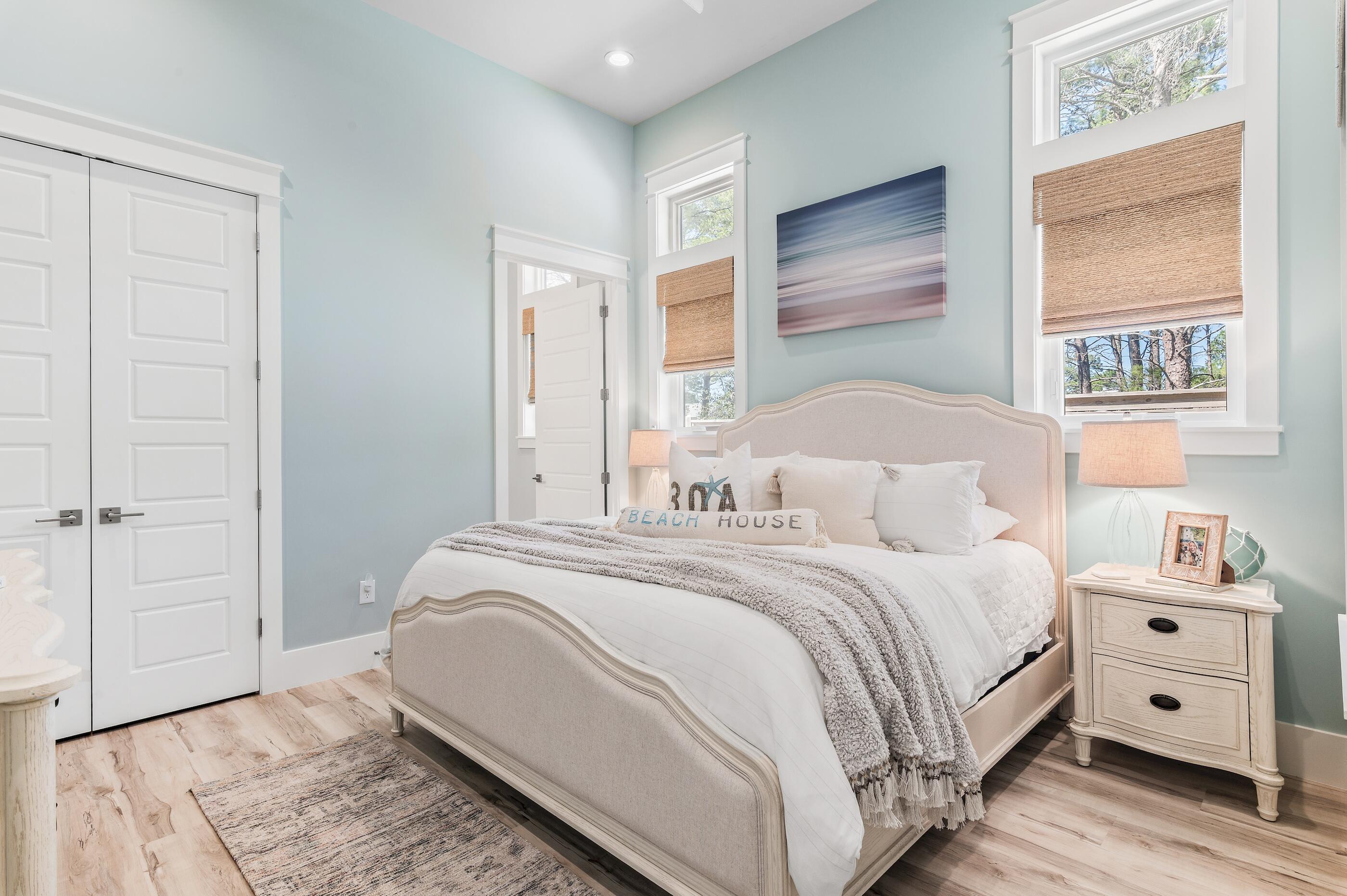 88 Beth Lane Santa Rosa Beach, FL 32459 - Photo 36 of 79 a bedroom with a large bed and a window