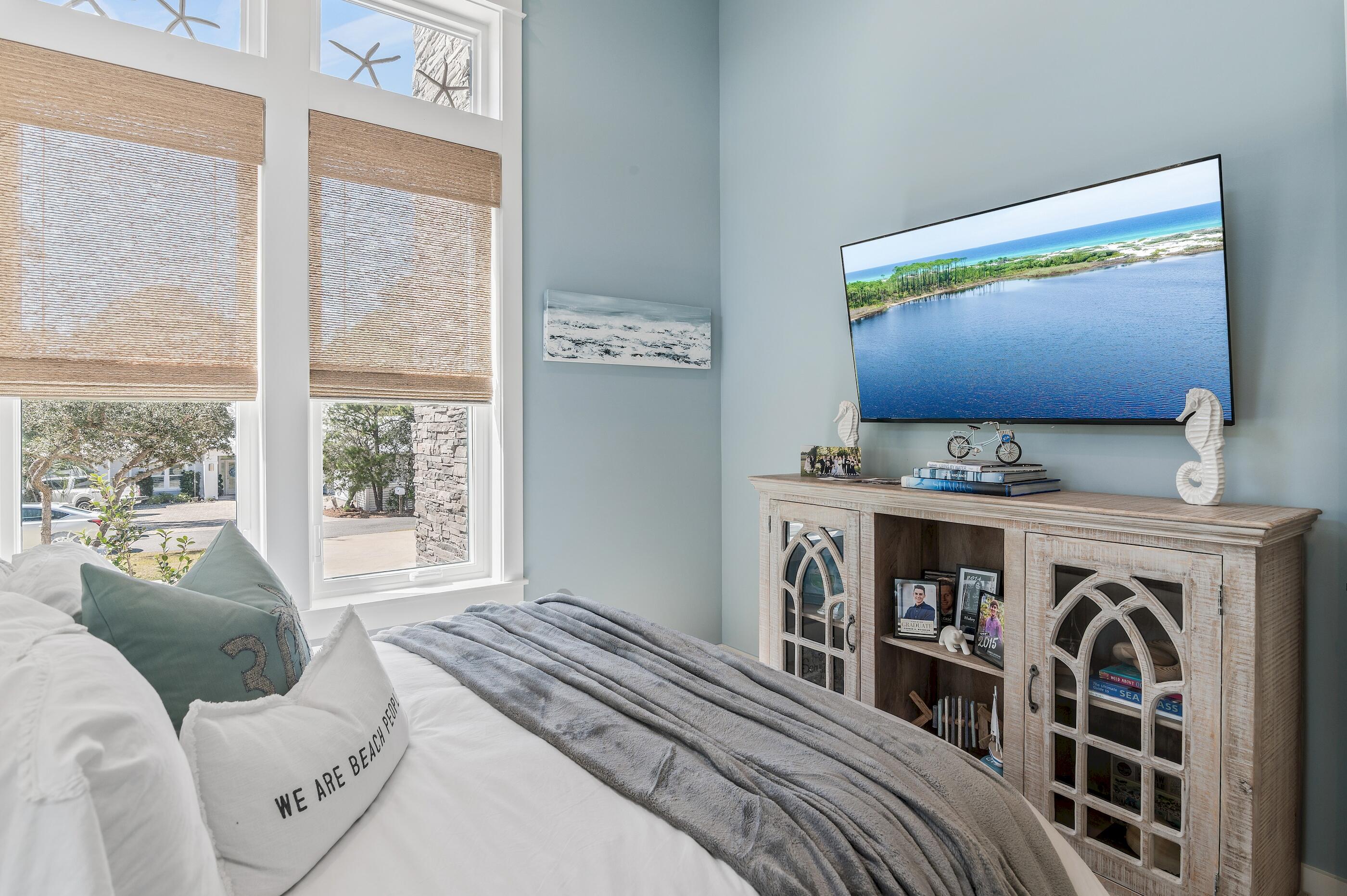 88 Beth Lane Santa Rosa Beach, FL 32459 - Photo 39 of 79 a bedroom with a bed and a window