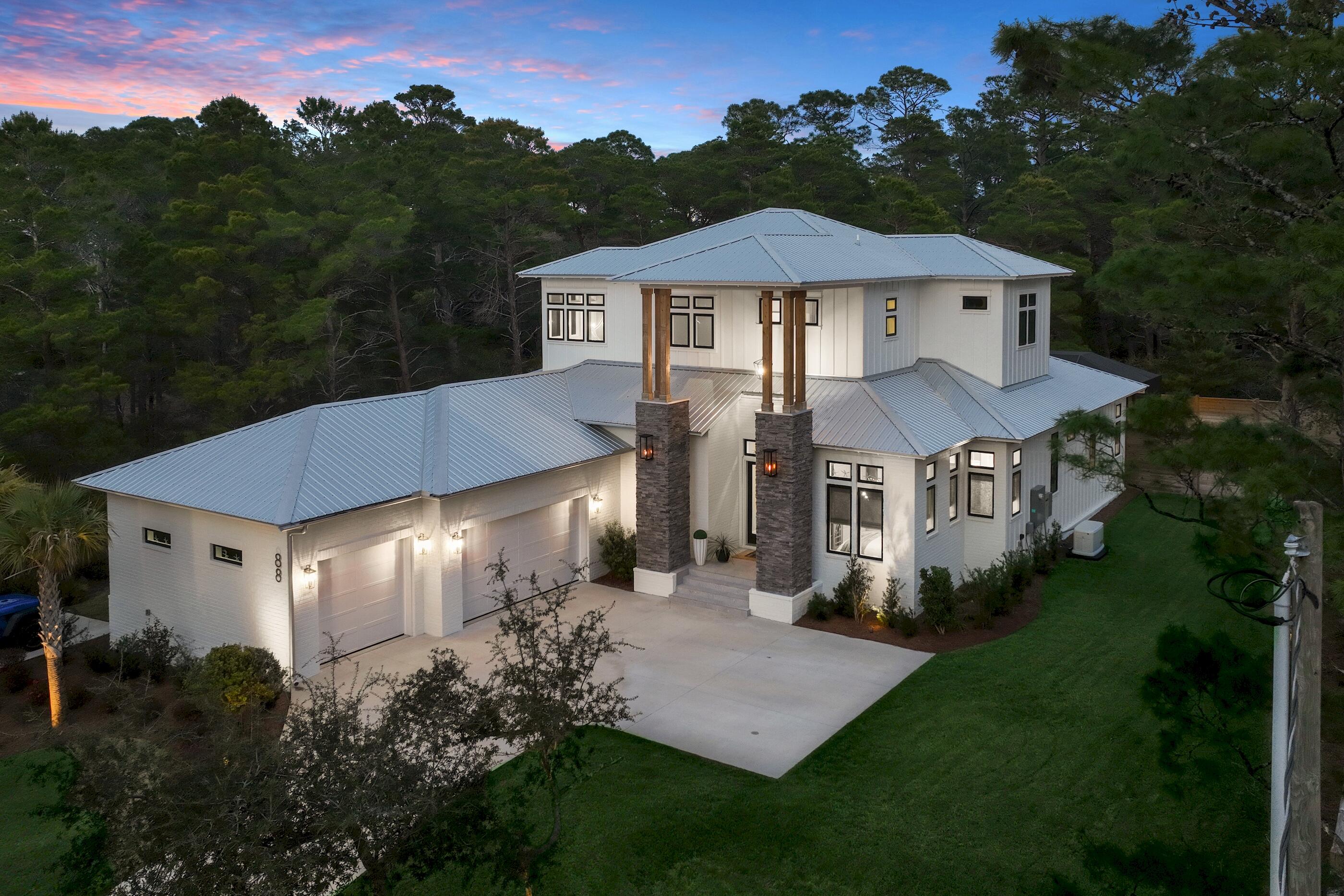 88 Beth Lane Santa Rosa Beach, FL 32459 - Photo 4 of 79 a front view of a house with a yard and green space