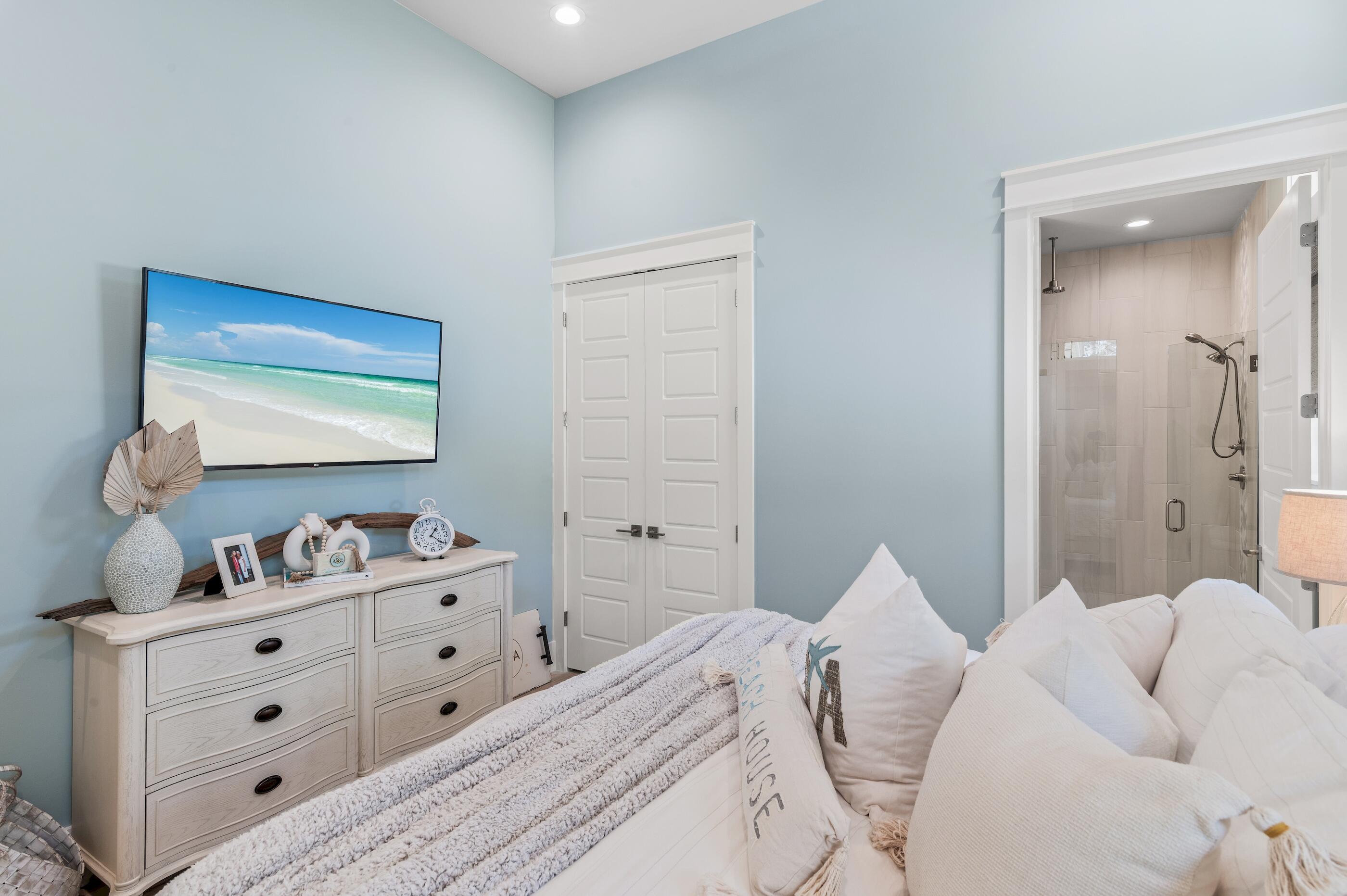 88 Beth Lane Santa Rosa Beach, FL 32459 - Photo 43 of 79 a bedroom with a bed and a dresser