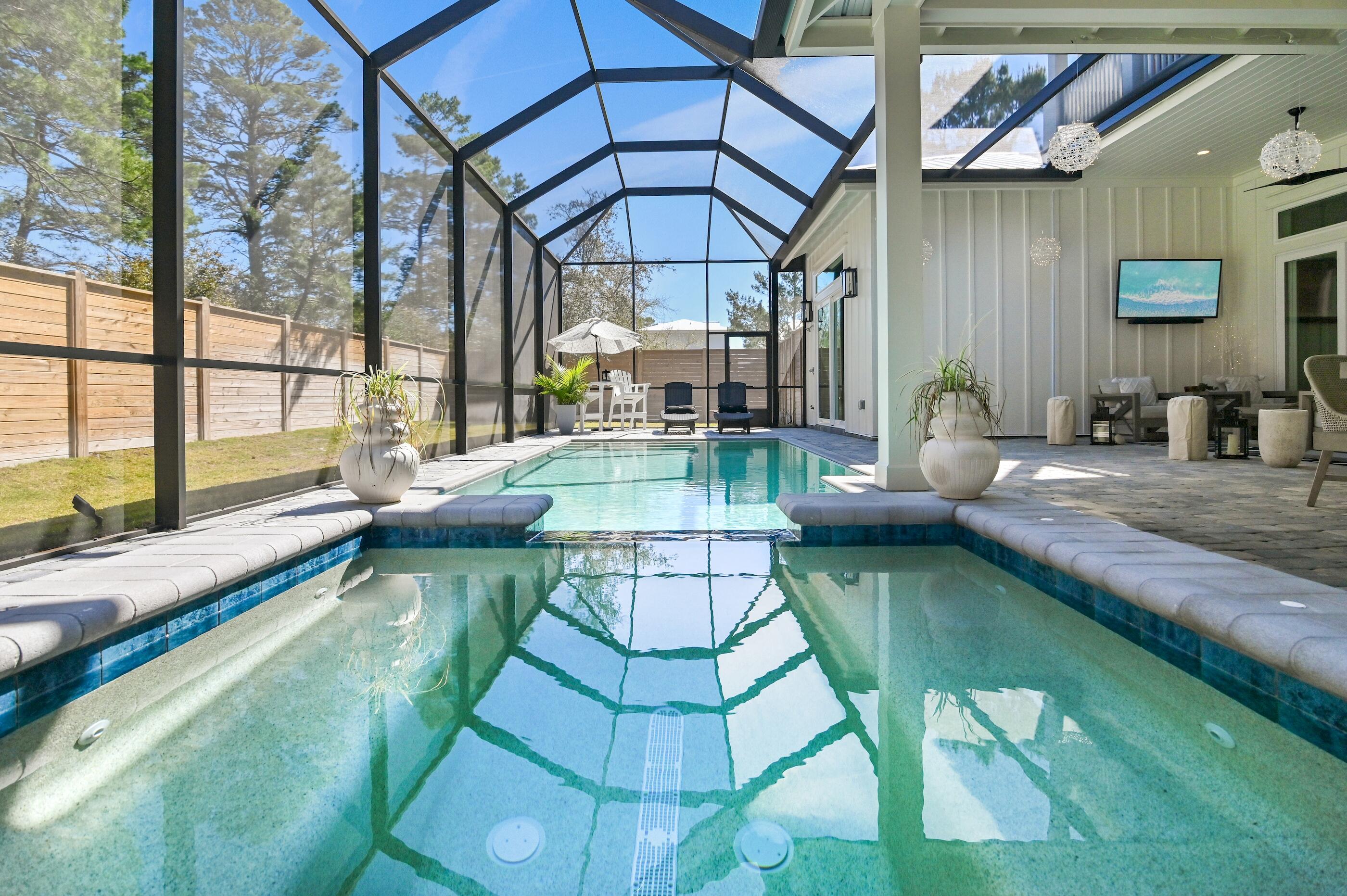 88 Beth Lane Santa Rosa Beach, FL 32459 - Photo 61 of 79 a view of a swimming pool with a patio