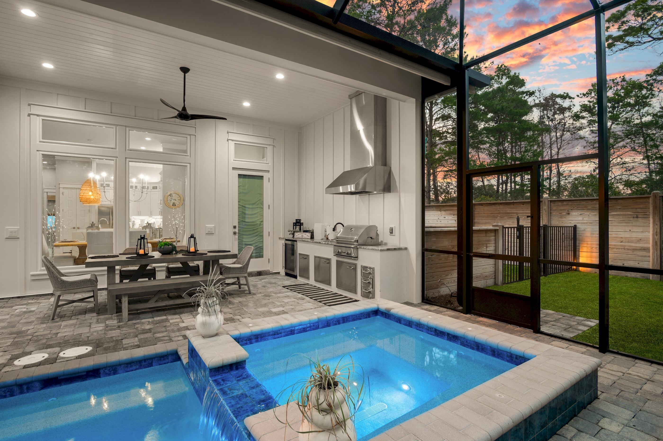 88 Beth Lane Santa Rosa Beach, FL 32459 - Photo 63 of 79 a living room with furniture wooden floor and a table