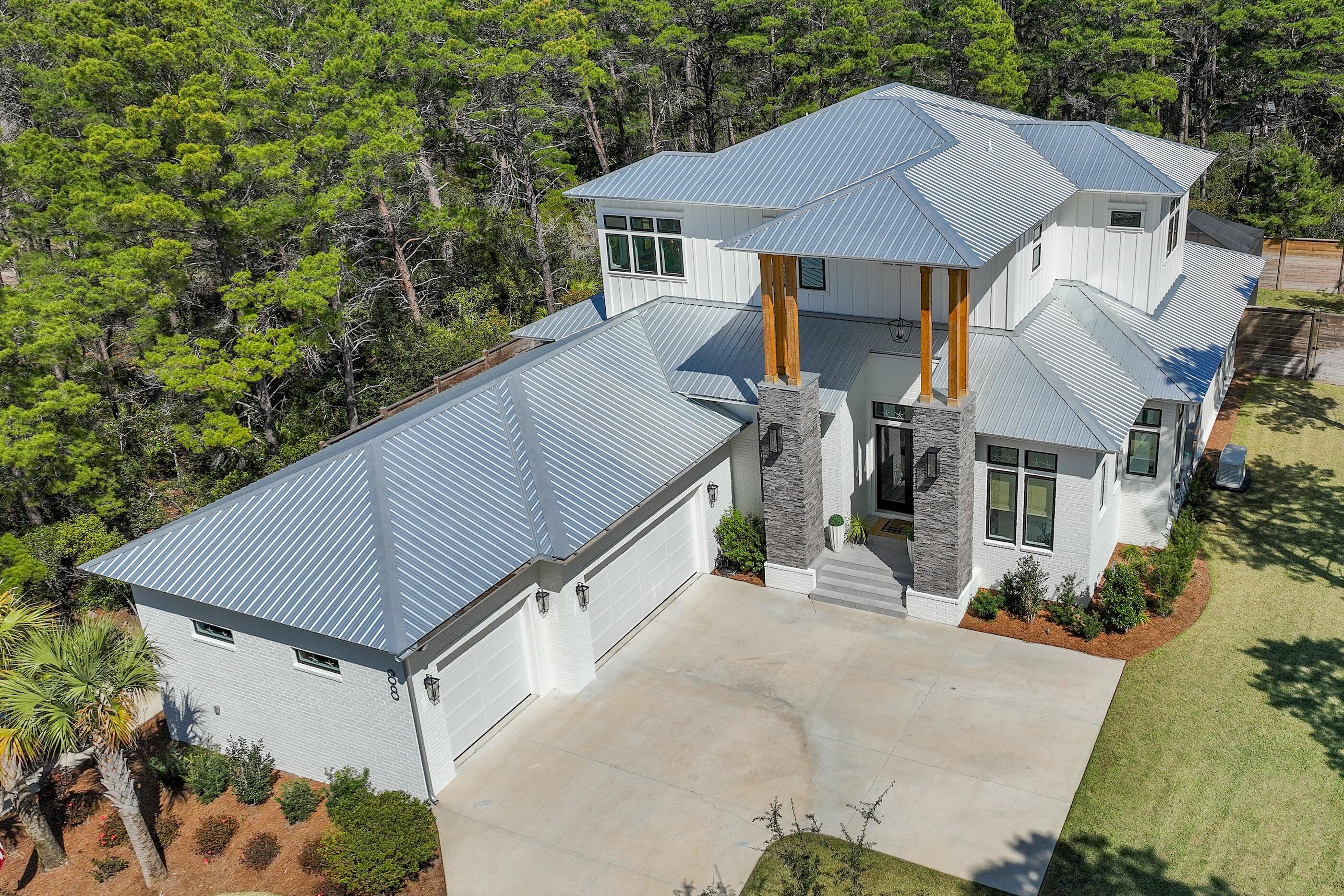 88 Beth Lane Santa Rosa Beach, FL 32459 - Photo 10 of 79 a aerial view of a house with yard and sitting area