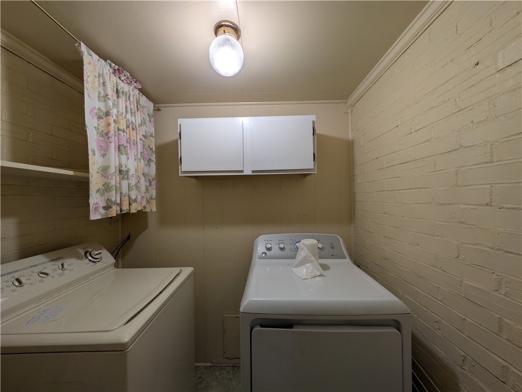 1000 Hickory Lane Anderson, SC 29624 - Photo 23 of 37 This dedicated laundry space offers practical convenience for daily chores.