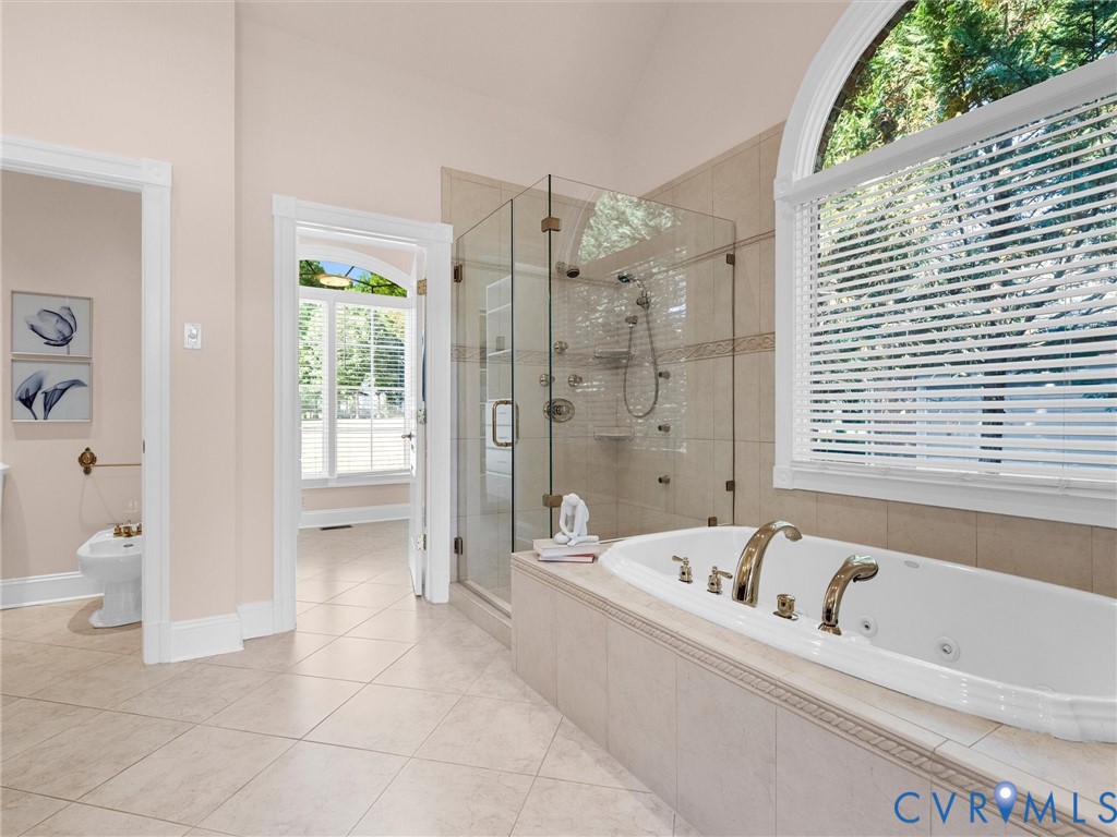 13612 Waterswatch Court Midlothian, VA 23113 - Photo 36 of 88 a bathroom with a bathtub and a shower
