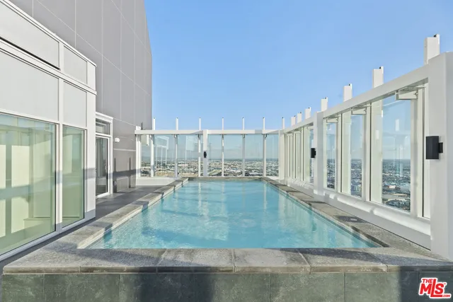 a view of a living room and entryway